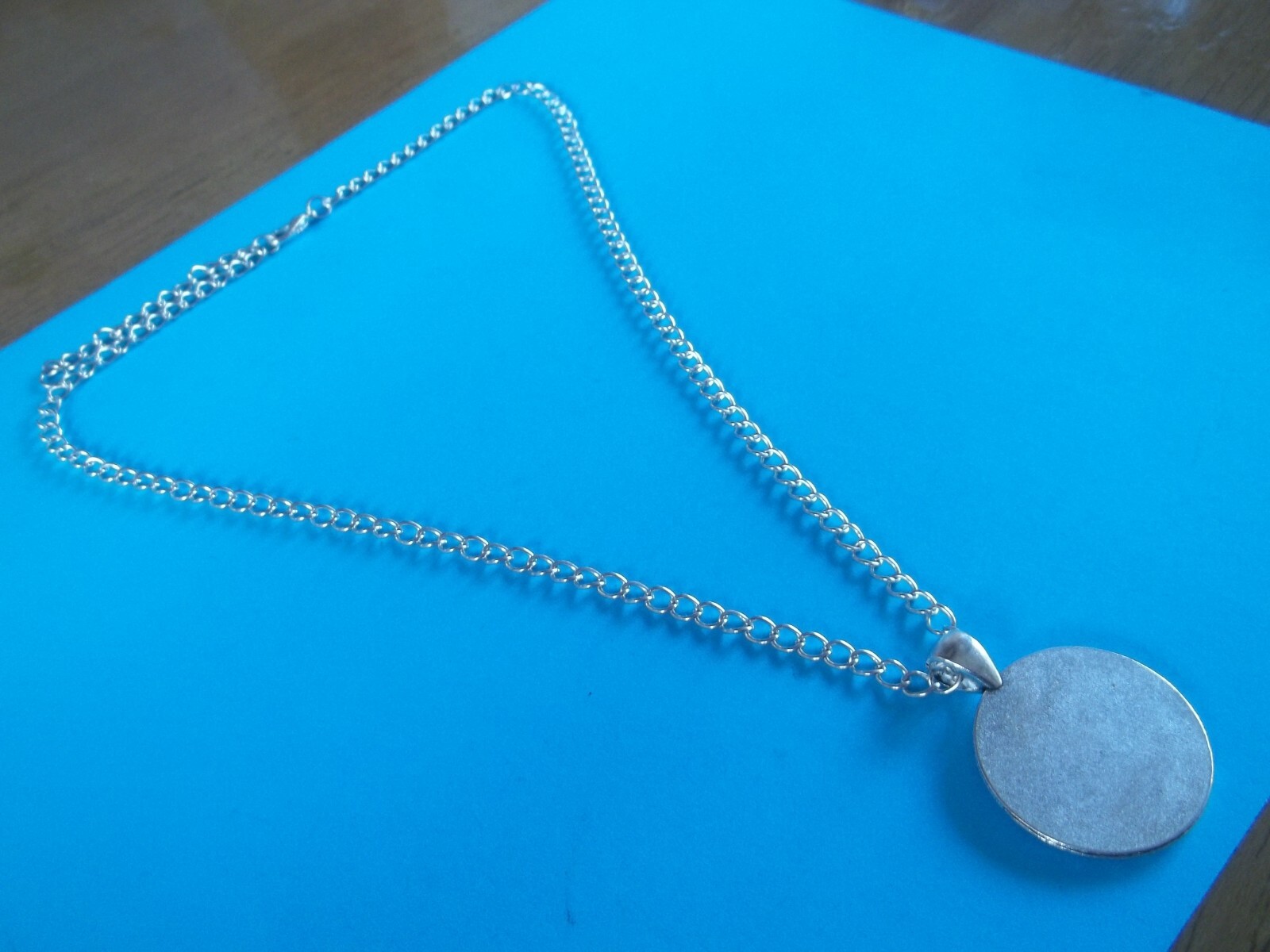 BRITANNIA FARTHING – LIMITED EDITION – SILVER CASED CURB NECKLACE – 1911 to 1936