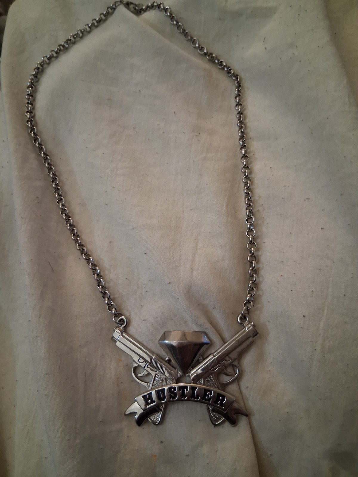 Silver Tone Cable Chain Necklace “HUSTLER” Pendant Charm w/ Crossed Pistols