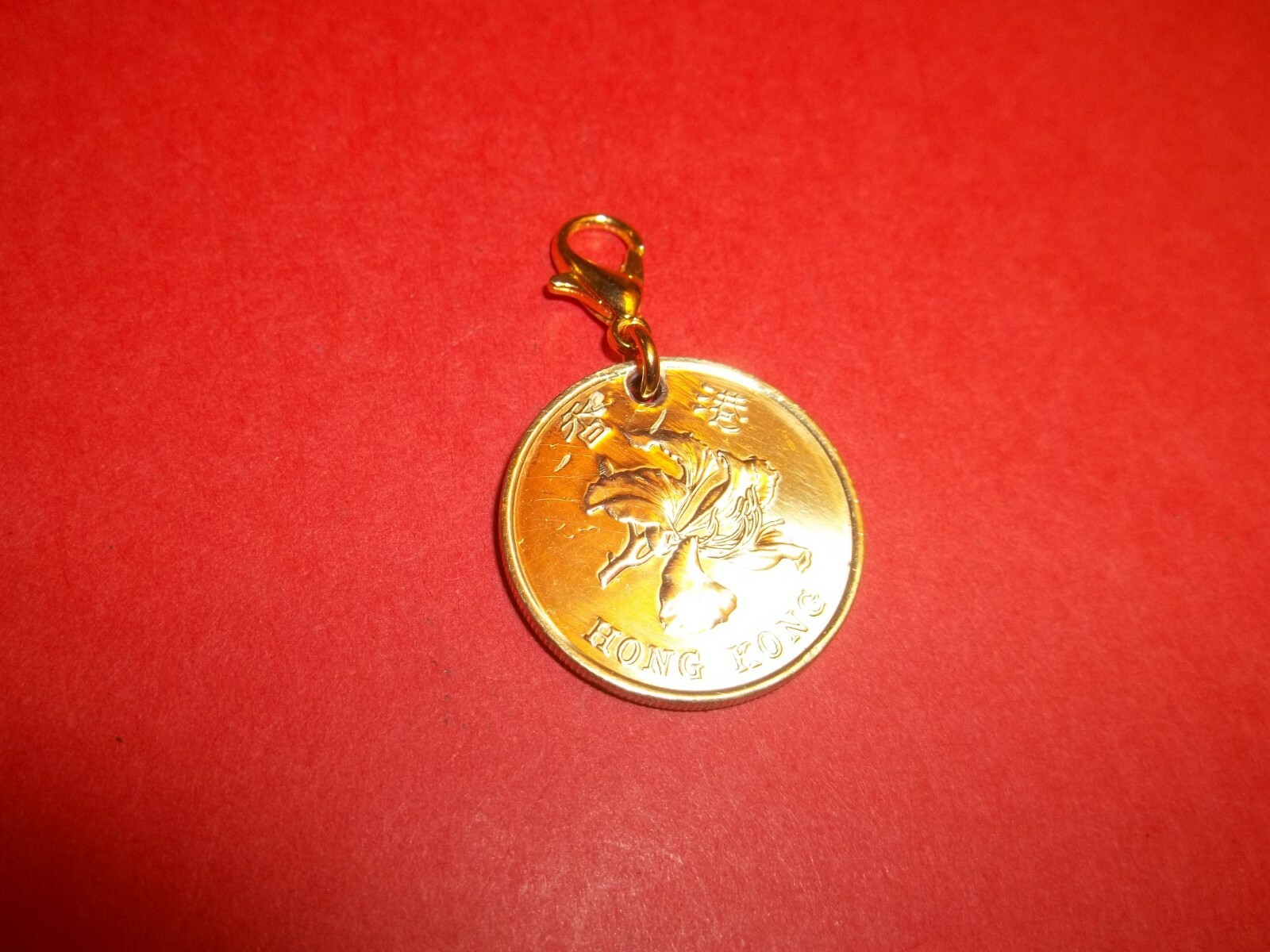 FIFTY (50) CENTS – HONG KONG – HIGHLY POLISHED PENDANT / CHARM – 1977 to 1998
