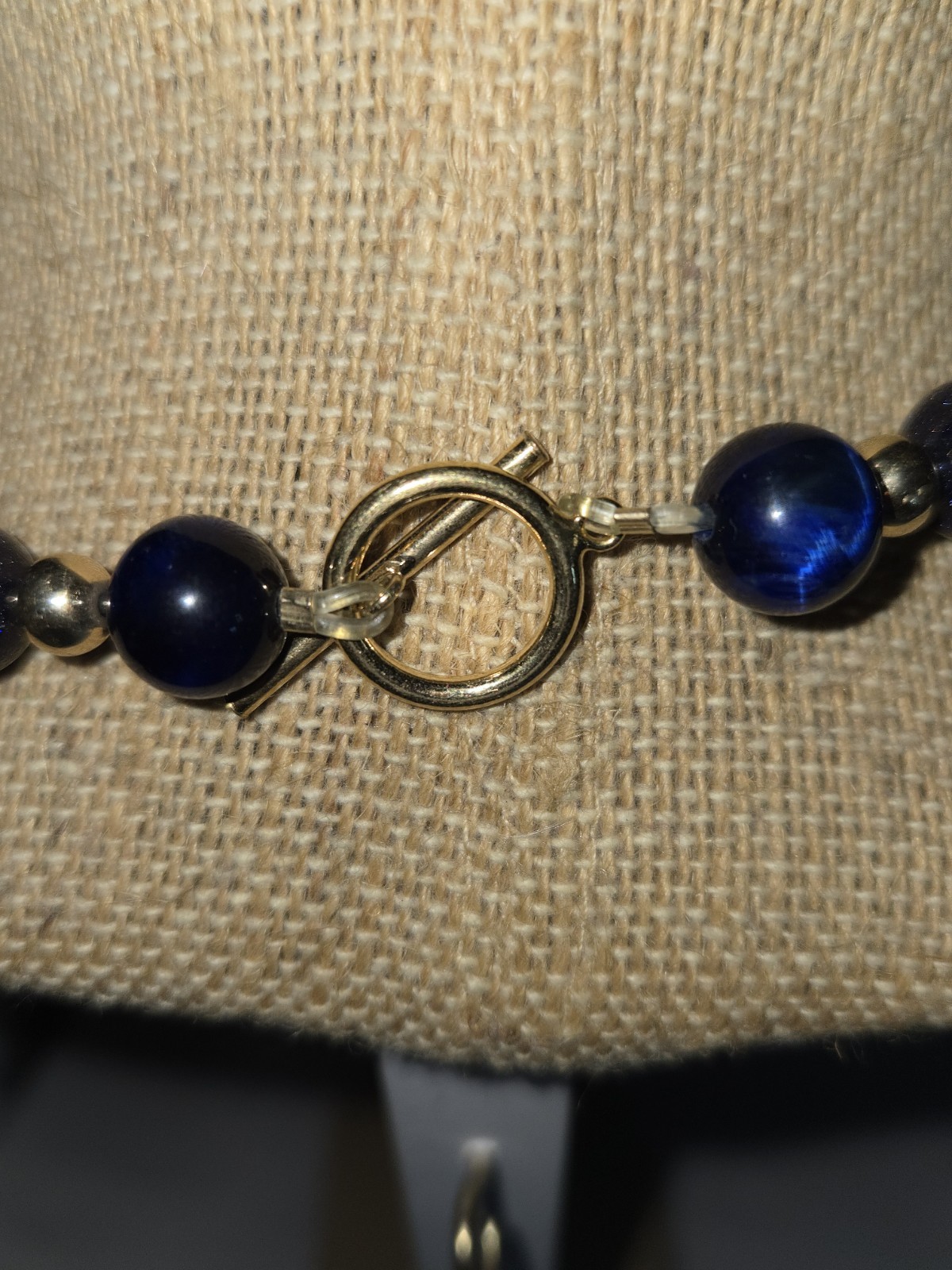 necklace round sparkly blue glass beads accented with small golden Spacer Beads