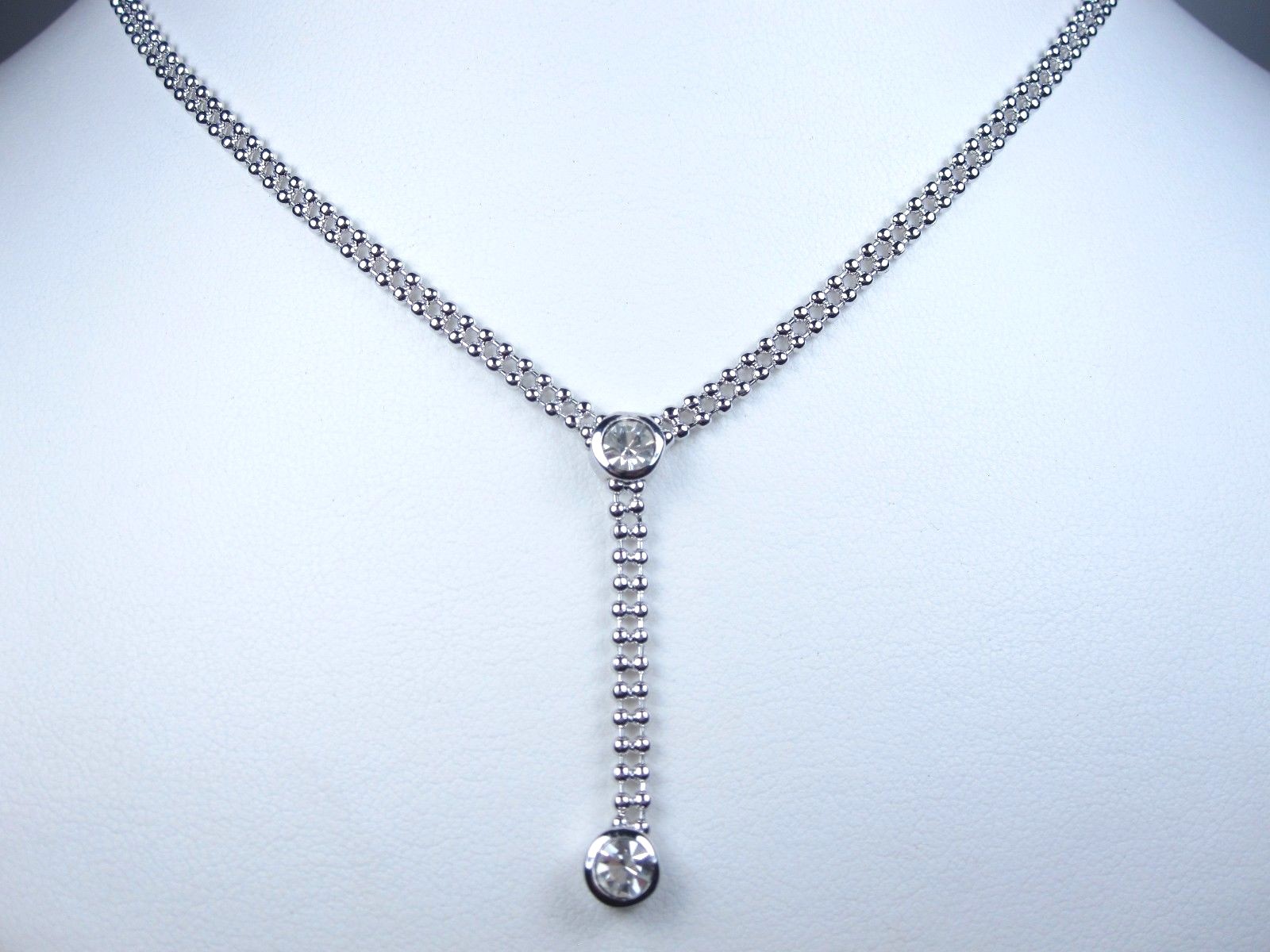 Nina Ricci Rhodium Plated Necklace with Swarovski Crystals – 14-16″ length 0589