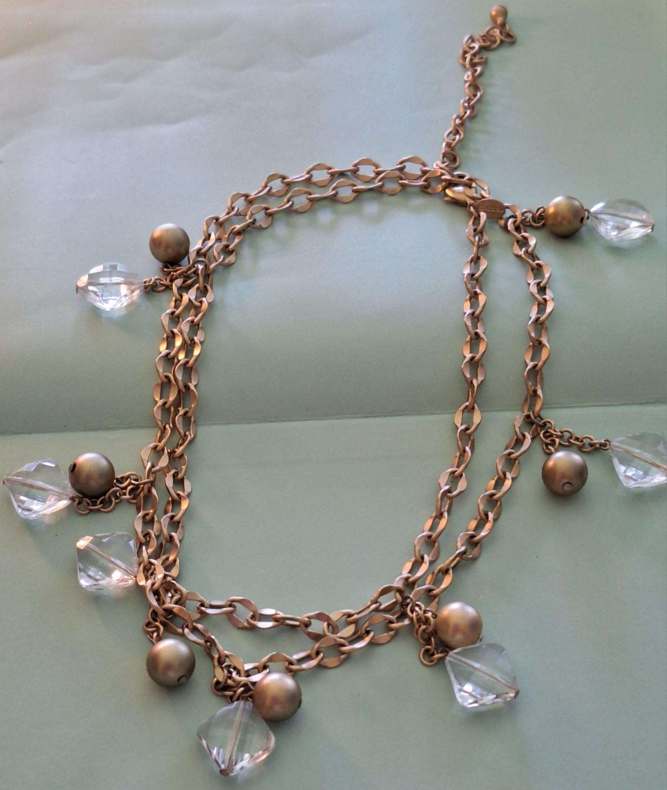 CHICO’S 18 INCH LONG GOLD COLORED BALLS AND COLORLESS STONE STATEMENT NECKLACE