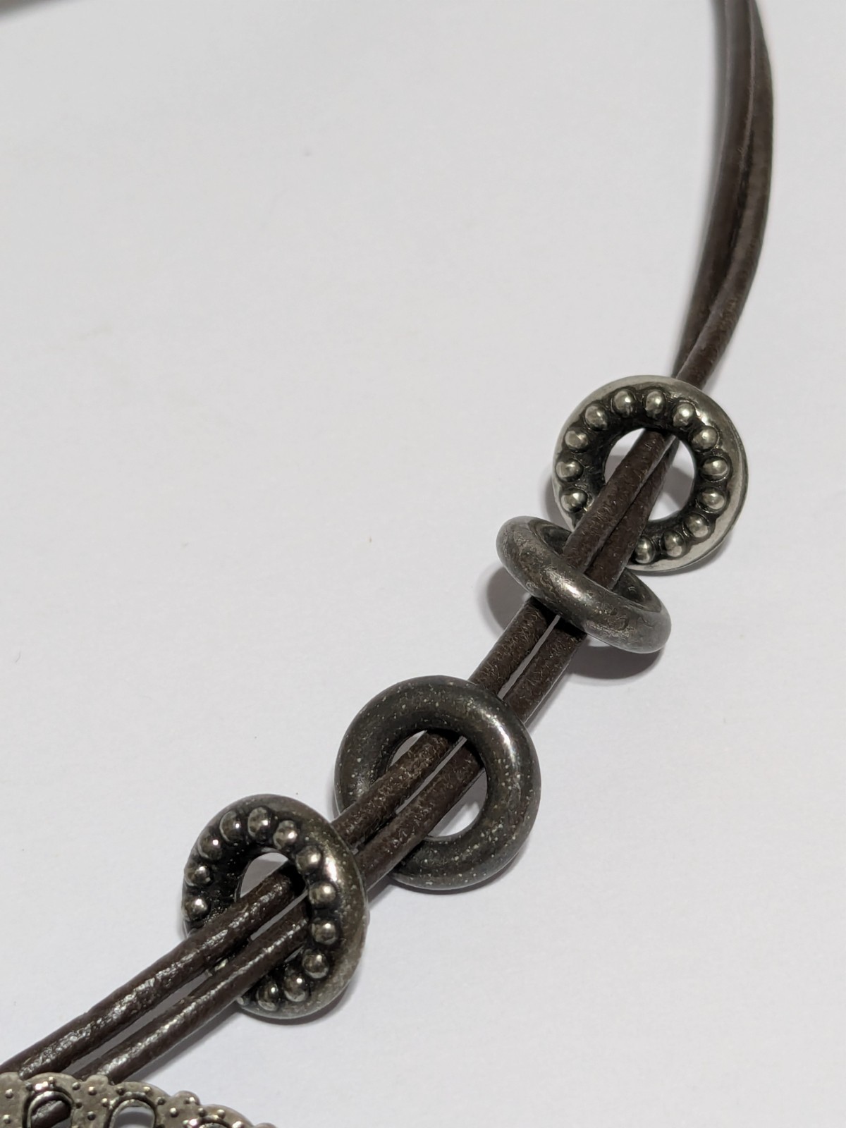 Faux Leather Brown Necklace With Silver Tone & Green Enamel Medallion Pendant