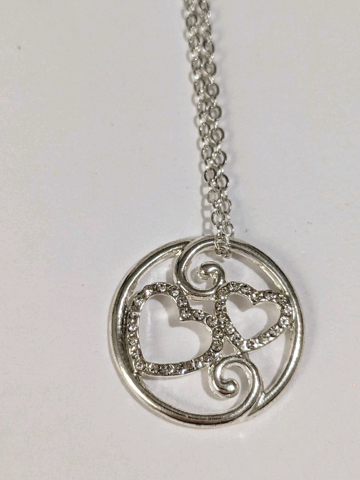 Intertwined Rhinestone Hearts Pendant Silver Tone Necklace. 18″. Modern.