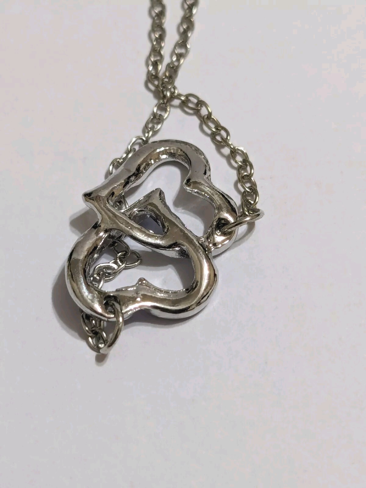 Interlinked Hearts Blue Rhinestones & Silver Tone Pendant Necklace. 16″. 2″ Ext.