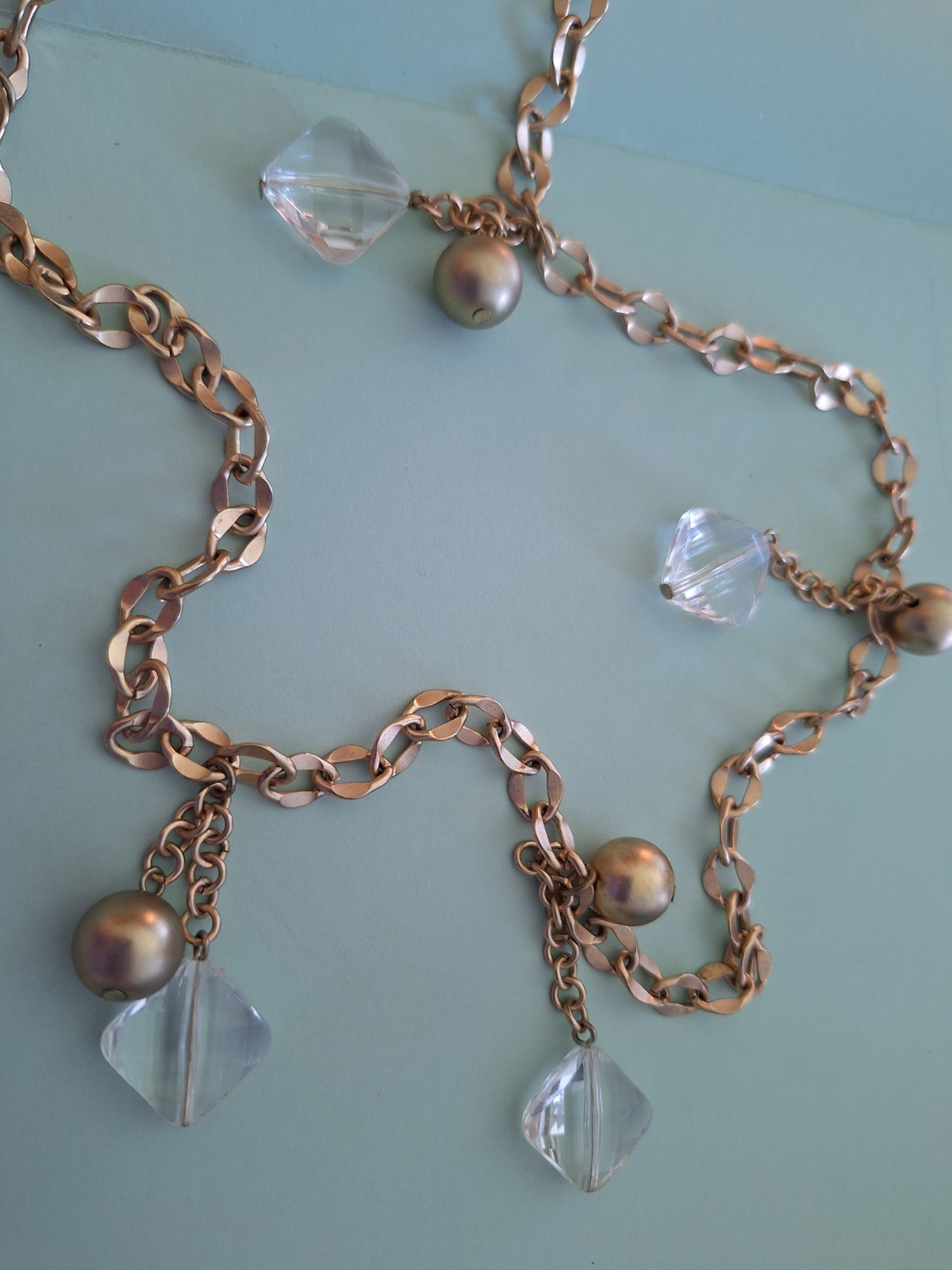 CHICO’S 18 INCH LONG GOLD COLORED BALLS AND COLORLESS STONE STATEMENT NECKLACE