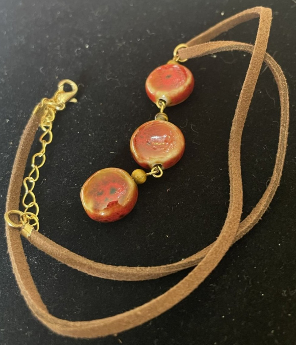 KJK signed Three Red Stones on Brown Rope Necklace. Gift box
