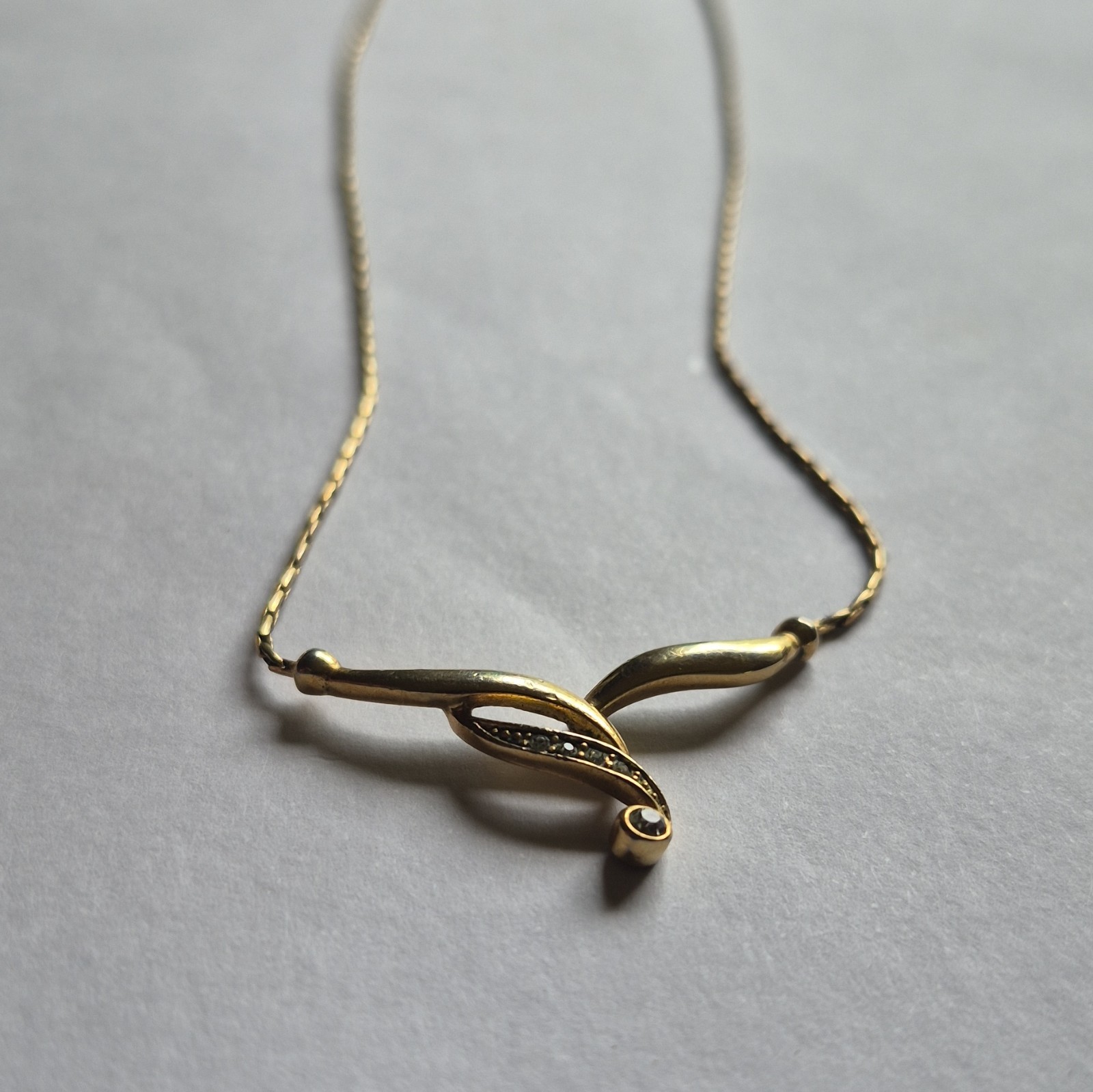 Gold Tone Asymmetrical Swirl Charm Pendant Necklace Adjustable Chain Spring Ring
