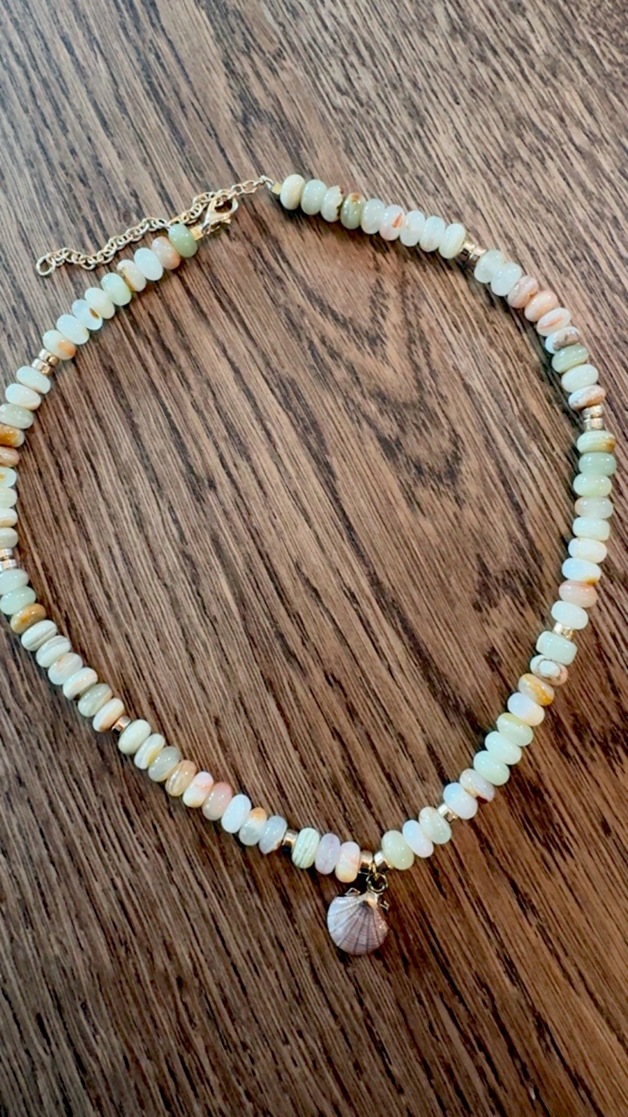 Green calcite stone necklace with gold seashell charm
