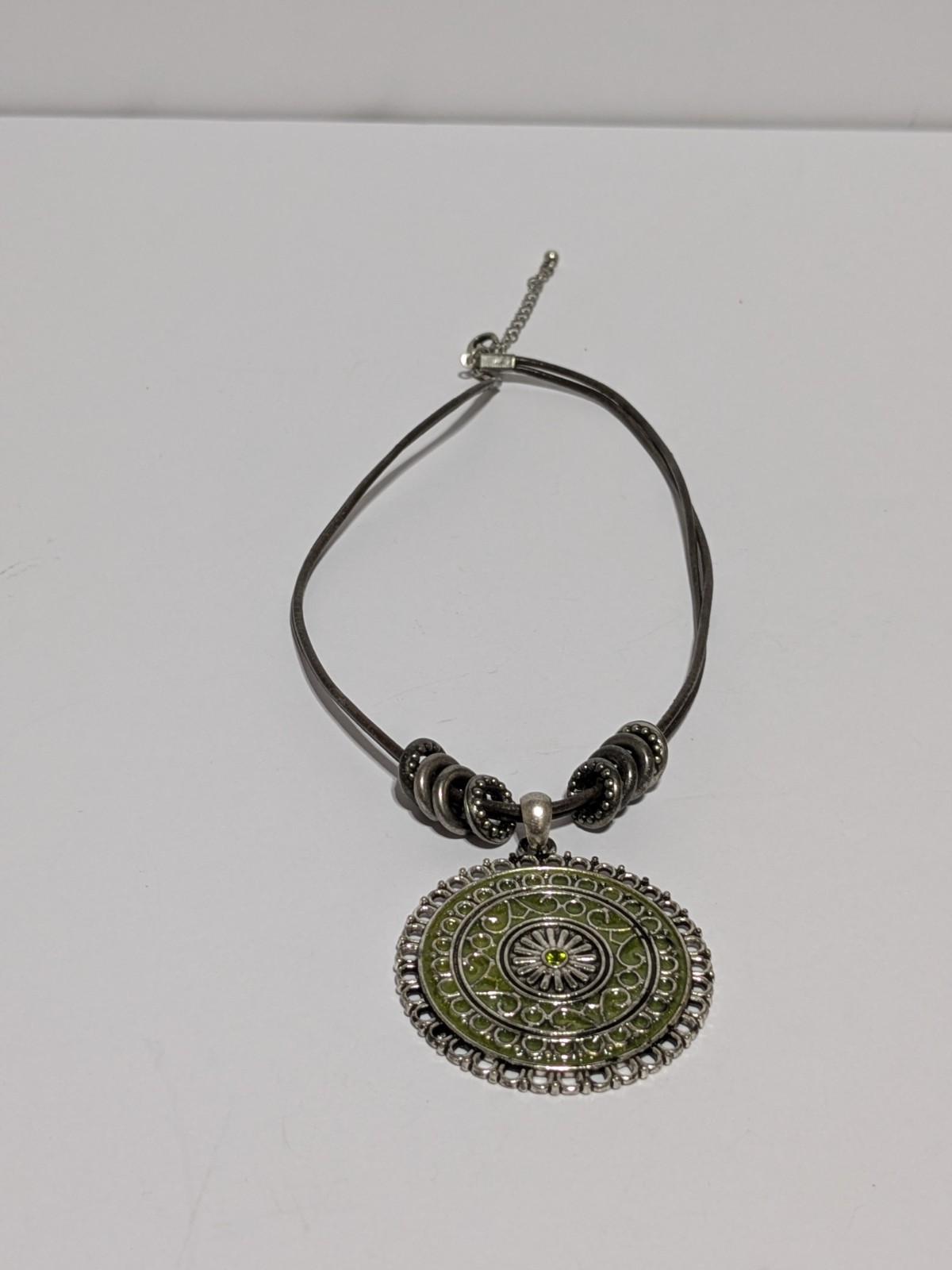 Faux Leather Brown Necklace With Silver Tone & Green Enamel Medallion Pendant
