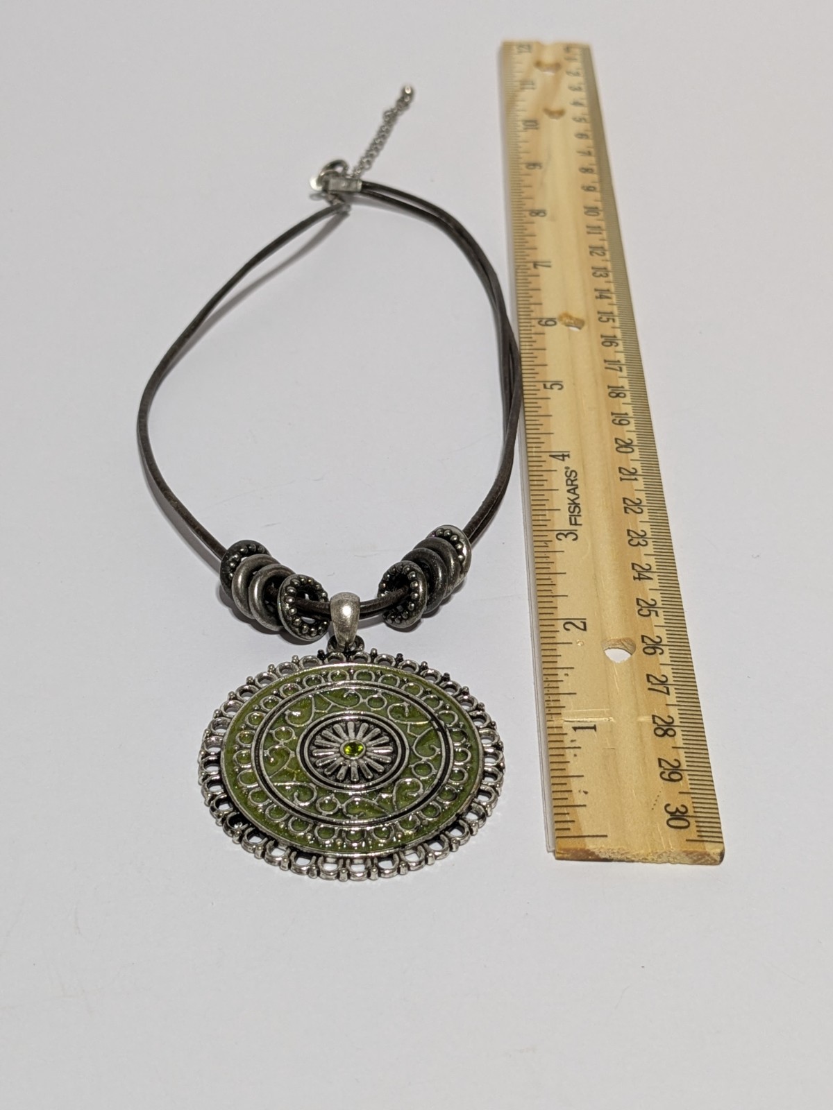 Faux Leather Brown Necklace With Silver Tone & Green Enamel Medallion Pendant
