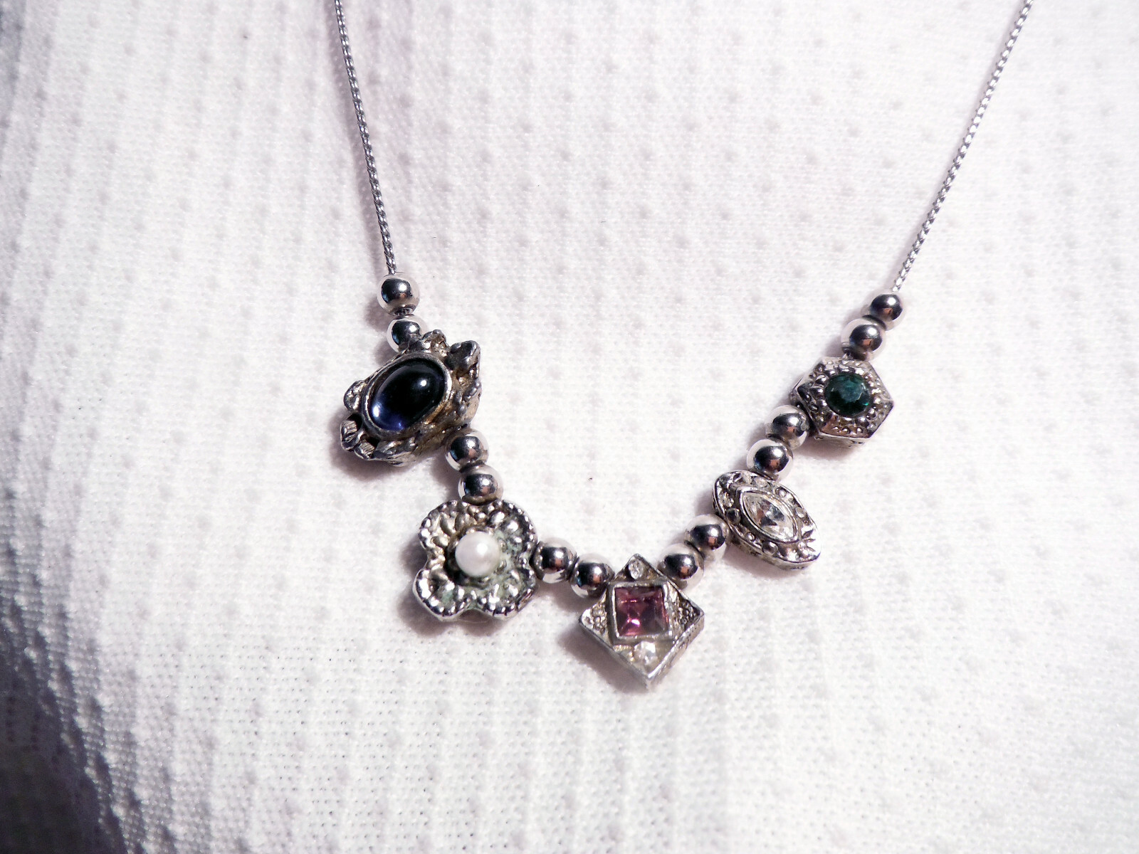 SILVER COLOR NECKLACE ~ VARIOUS COLORED STONES IN DIFFERENT SHAPES.