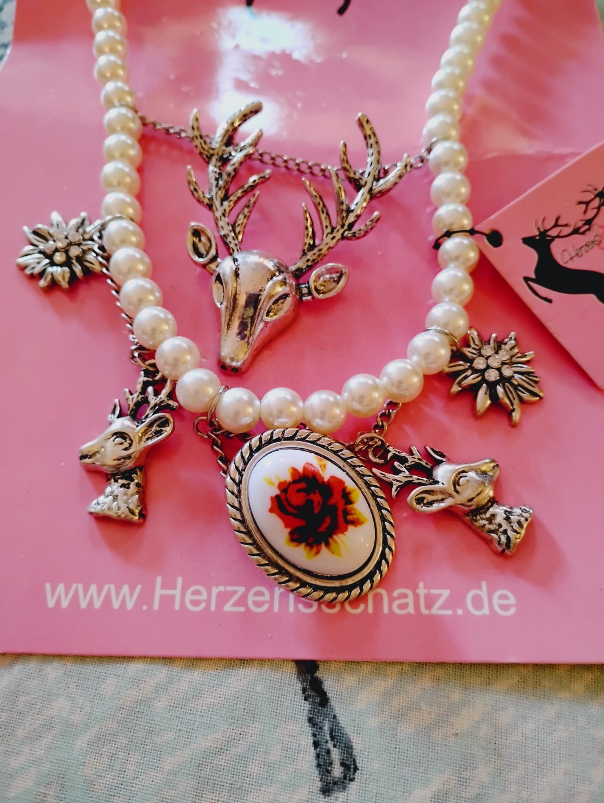 Fashion Jewelry.Germany, HERZENSSCHATZ Edelweiss, Deer charms with false pearls