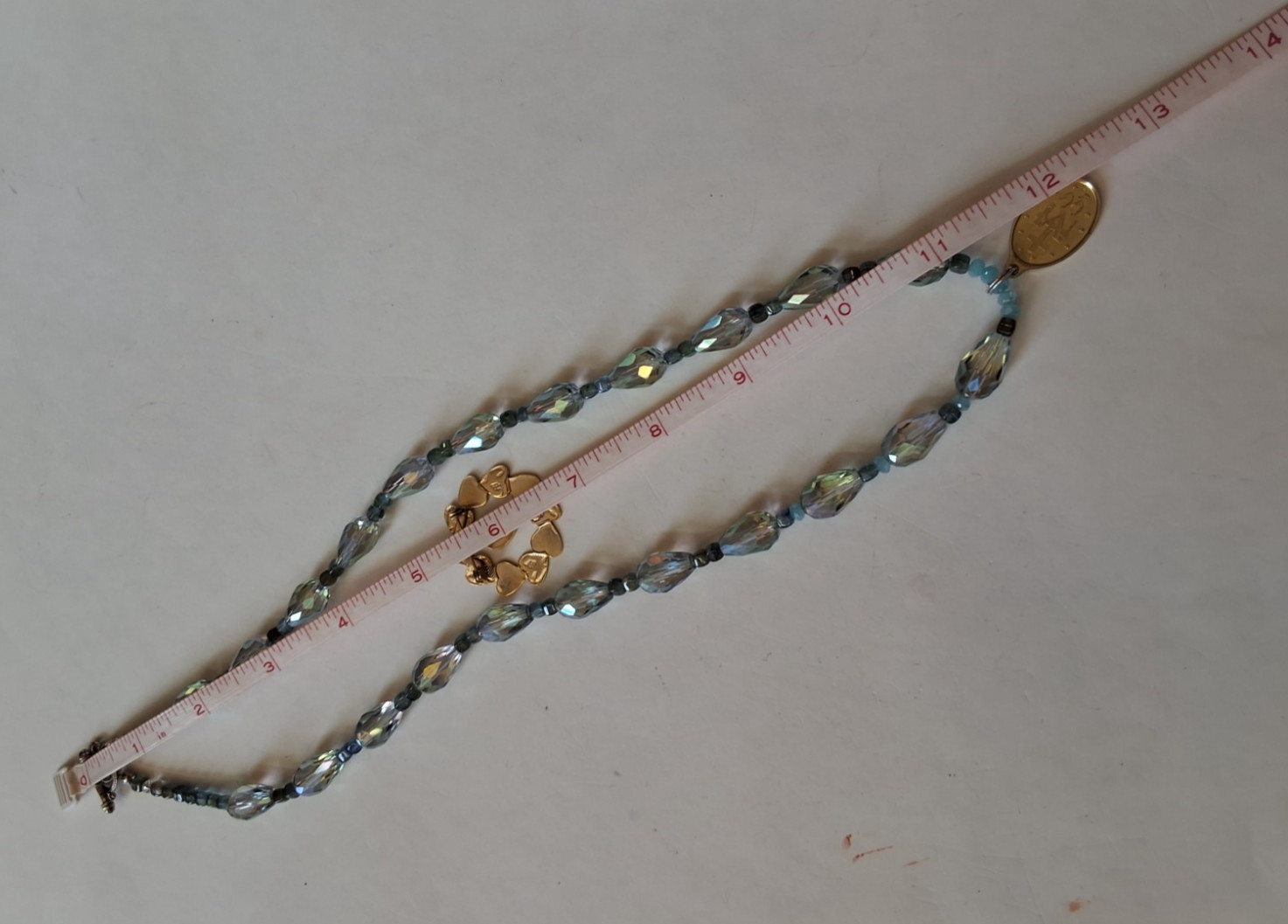 Iridescent Beaded Necklace With Gold Tone Miraculous Medal And Brooch
