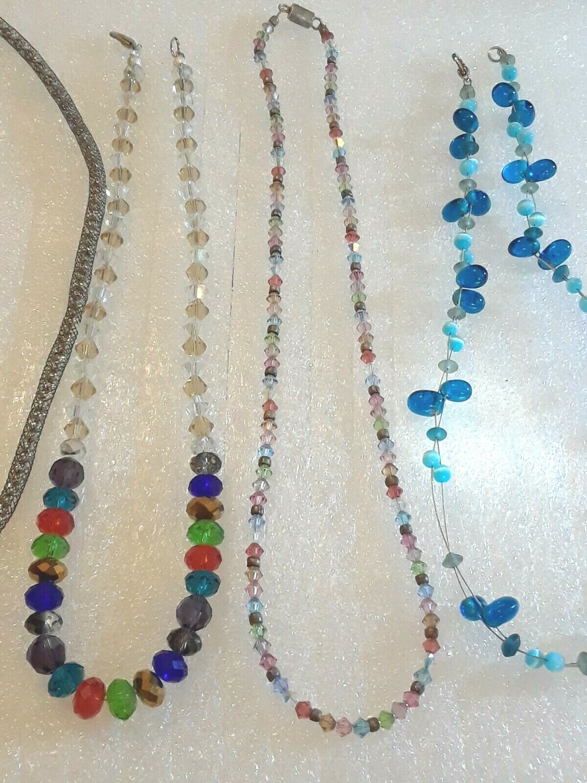 Beaded necklaces. Multi-color crystal beads, blue moon glow. You get all 5