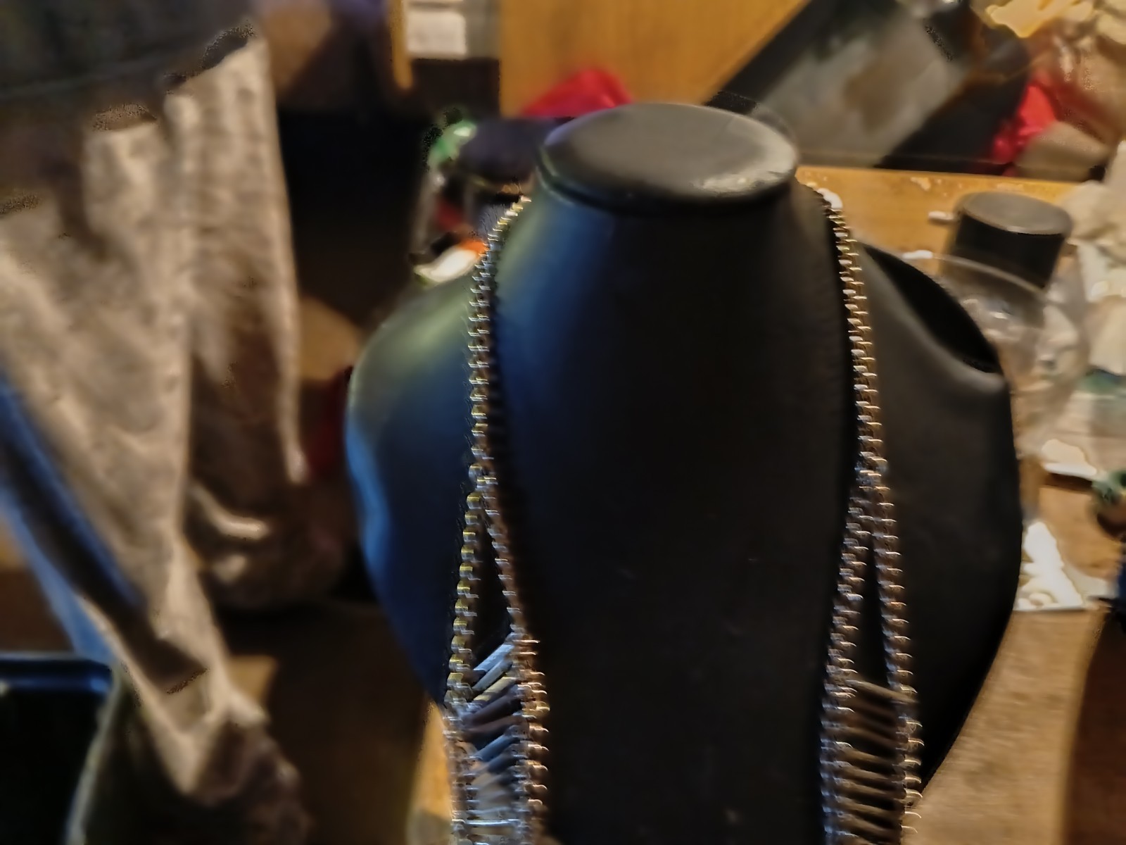 silver-toned bib choker features dangling teardrop rhinestones.