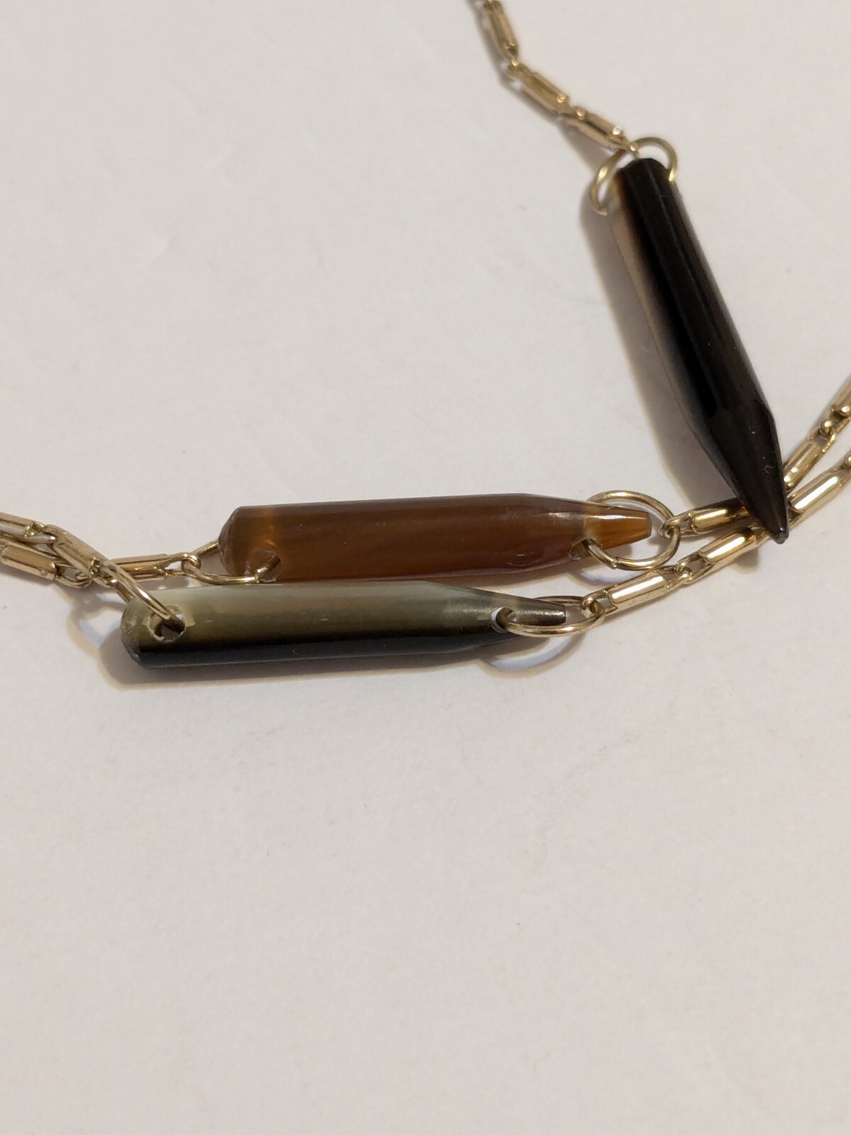 Gold Tone Y Drop Necklace With Acrylic Spear Shaped Beads. 28″ + 6.25″ Drop.