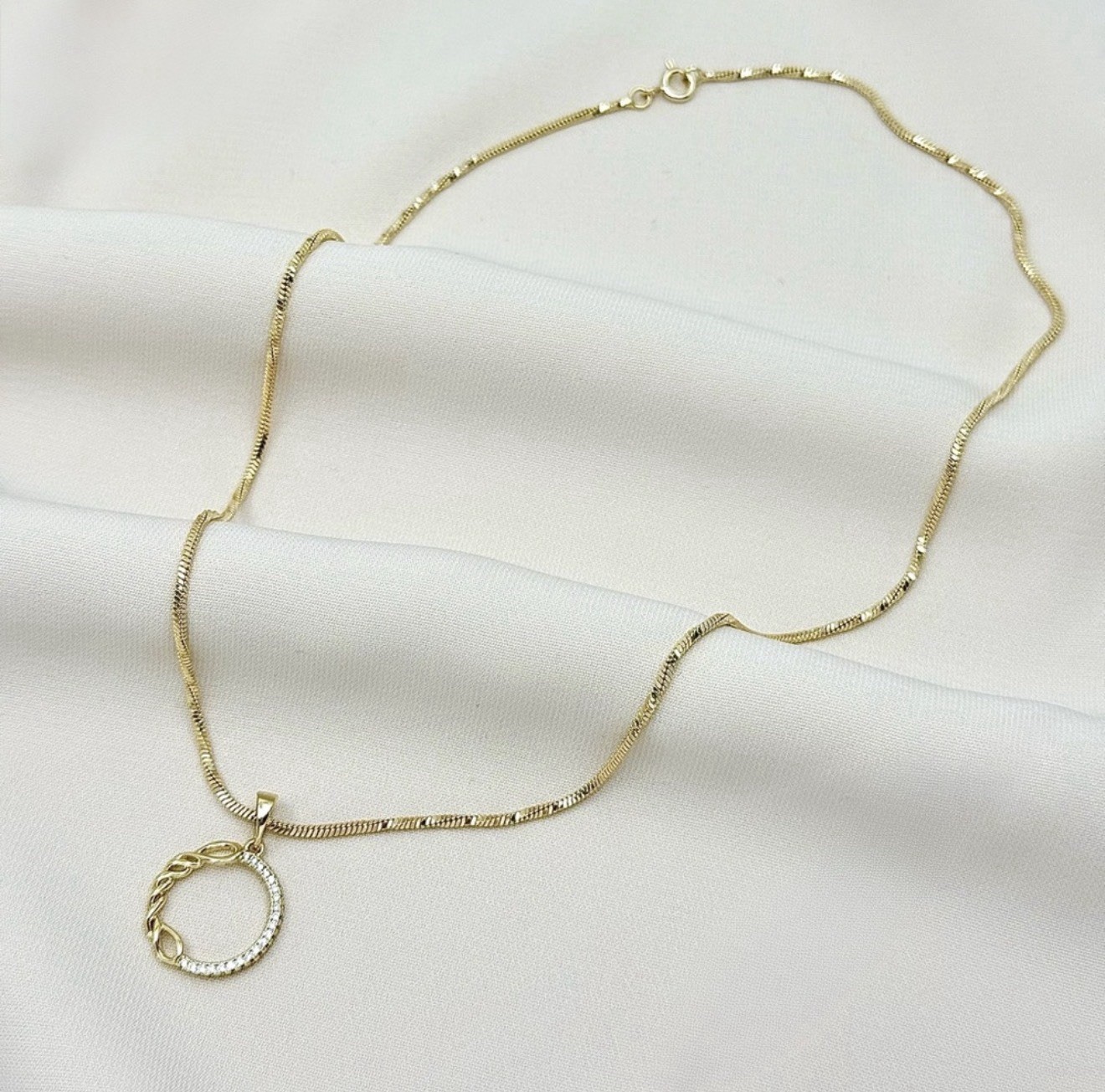 Gold Plated Twisted Circle Pendant Necklace – Pavé Crystal Infinity Round Charm