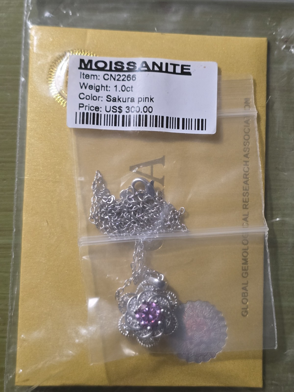 Rhodium Plated Moissanite Sakura Pink Spinning Flower Pendant With 16-18″…