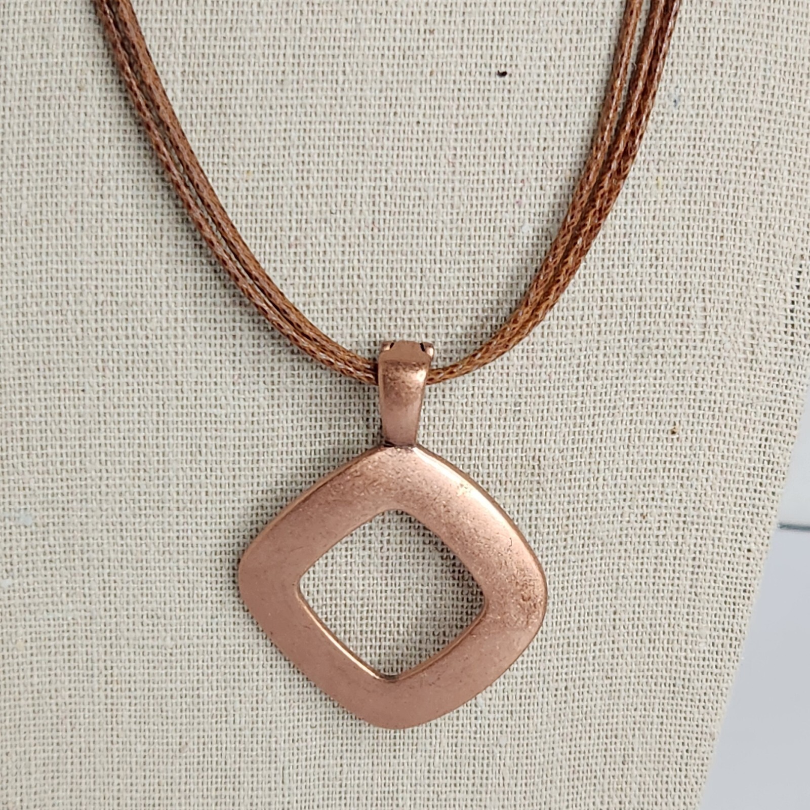 Boho Premier Designs Copper Tone Pendant On 3 Strand Faux Leather Chain