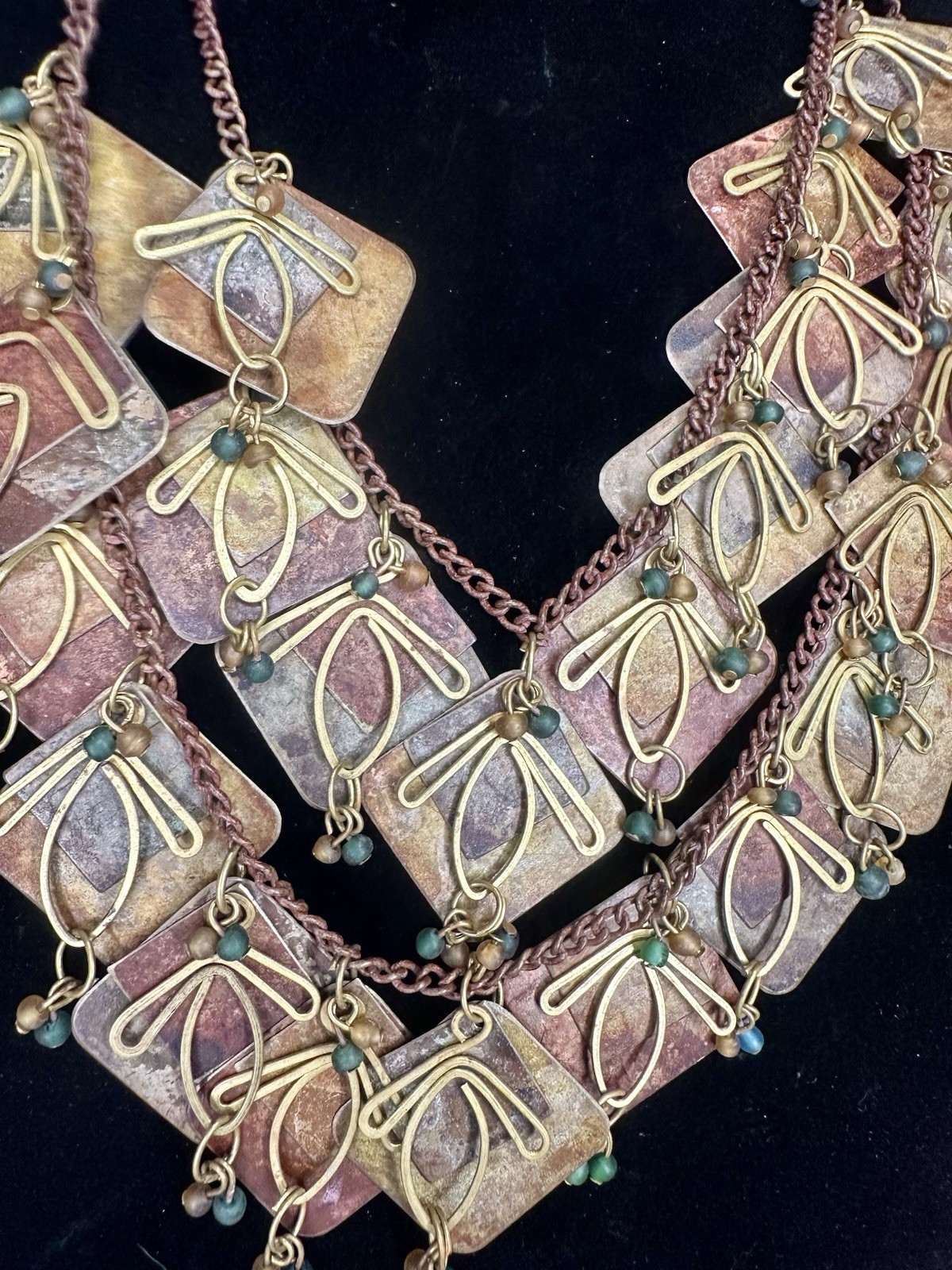 Vintage Metal Artisan Chain with Multi tiered Metal Patina Panels And Charms