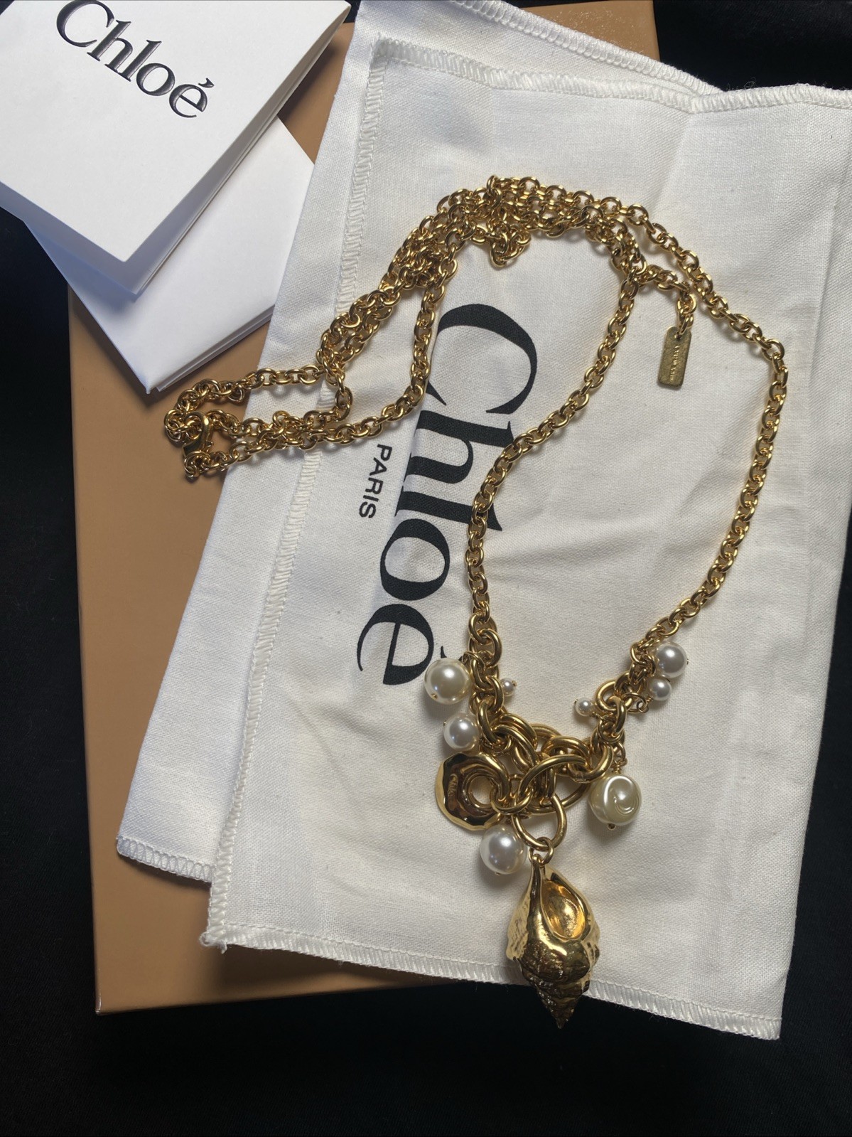 Chloe Shell pearl charm Gold Stone Designer Collection