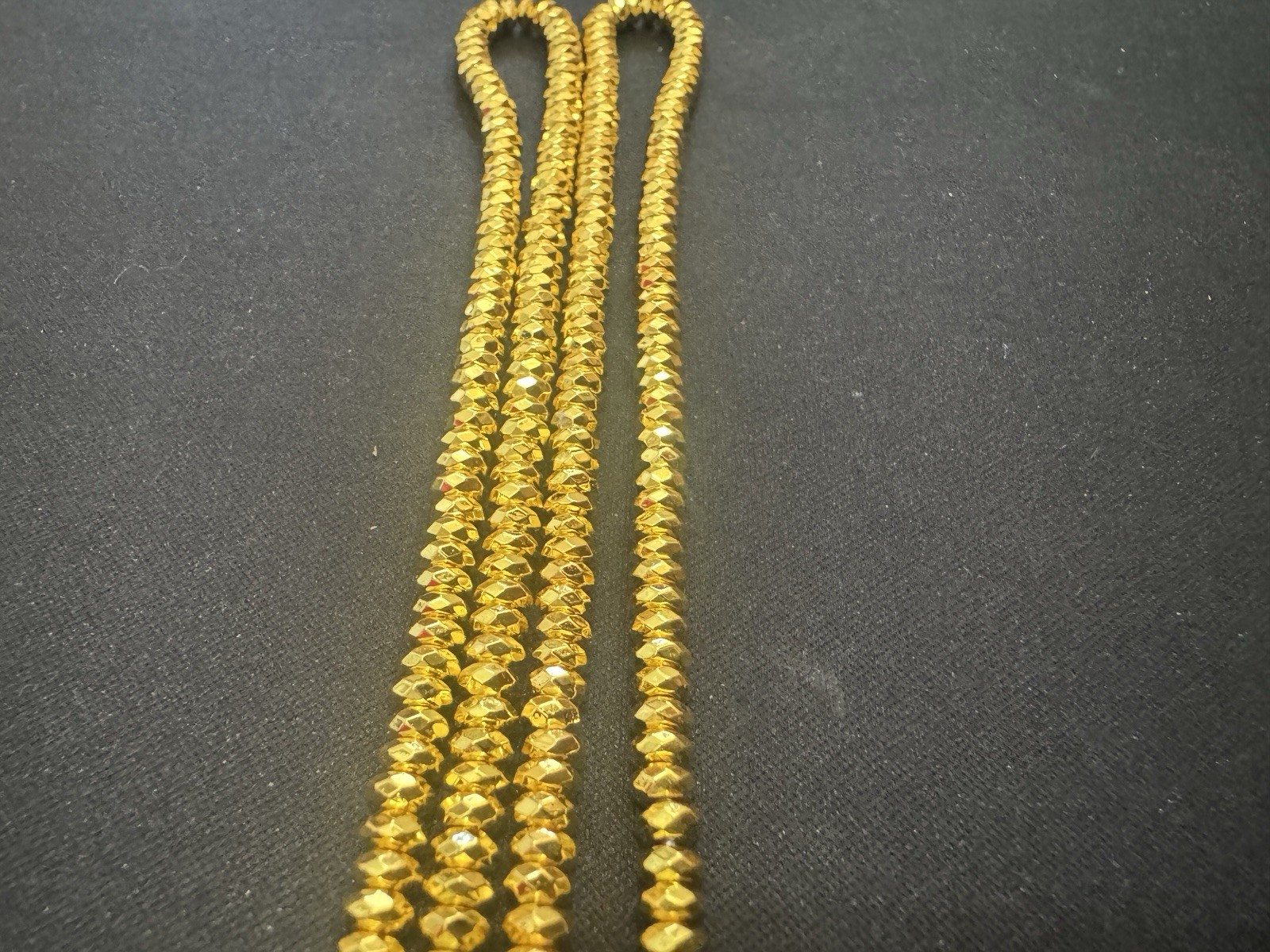 4mm gold hematite faceted roundel 15in