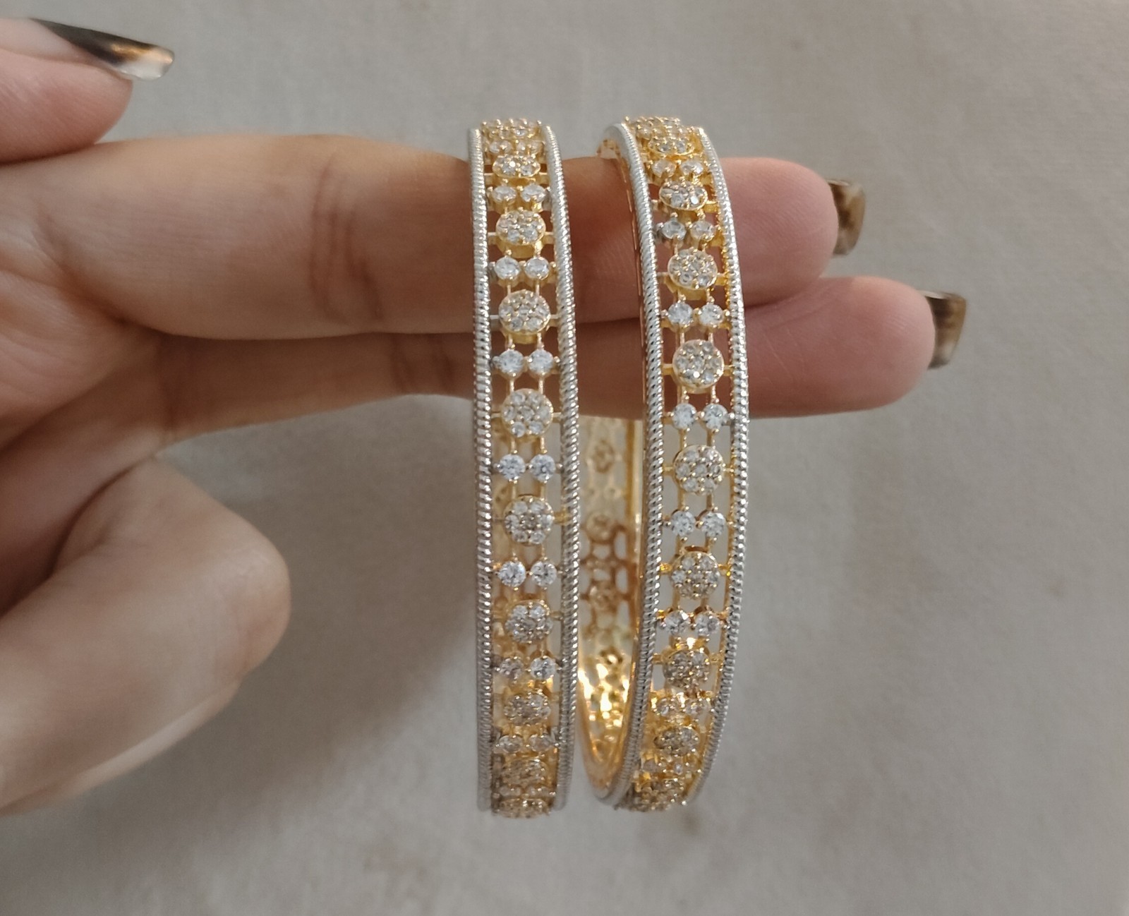 Runa Dual Tone Circular Diamond Style Designer Bangles Roz Jewellers.
