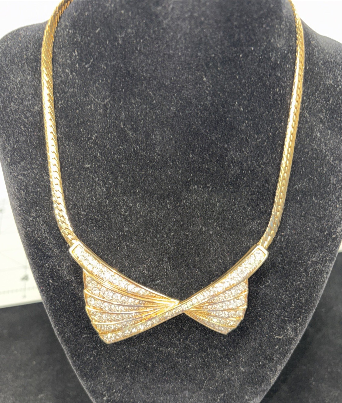 Beautiful Nina Ricci Pave Set Rhinestone Bow Tie Necklace in Goldtone