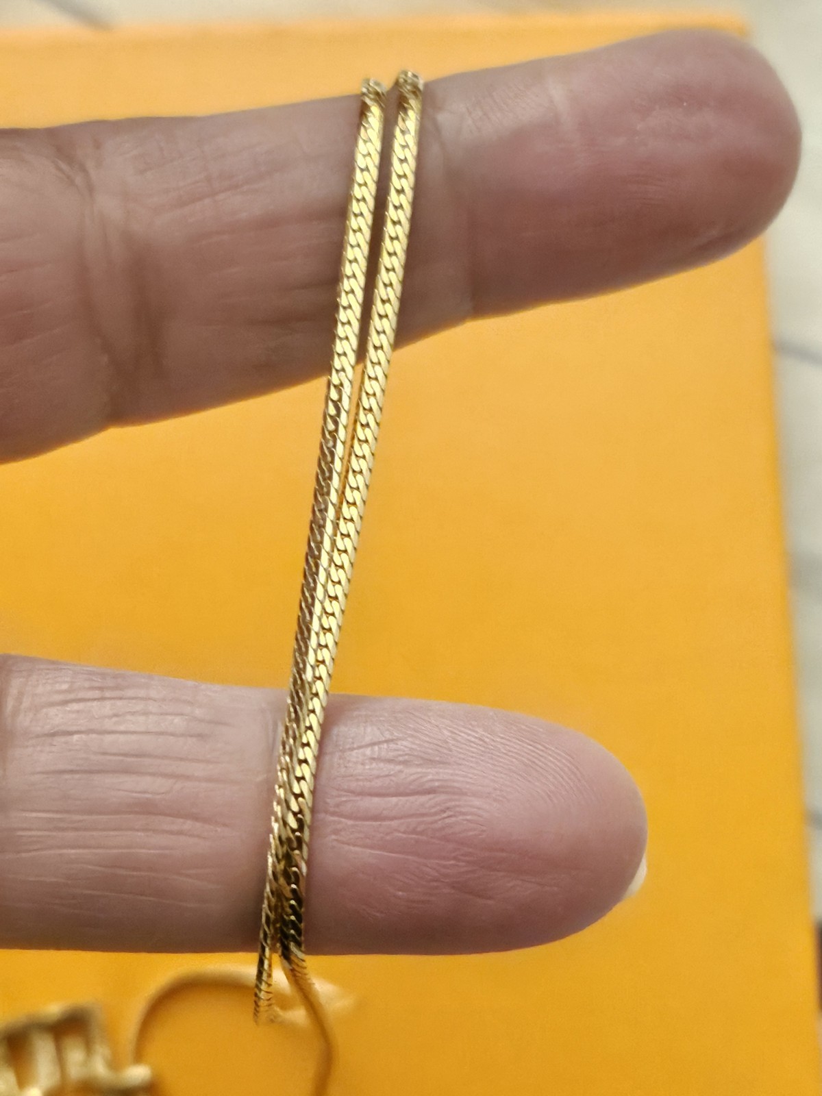 Givenchy Signed Gold Tone Herringbone Chain Square Logo Pendant Necklace