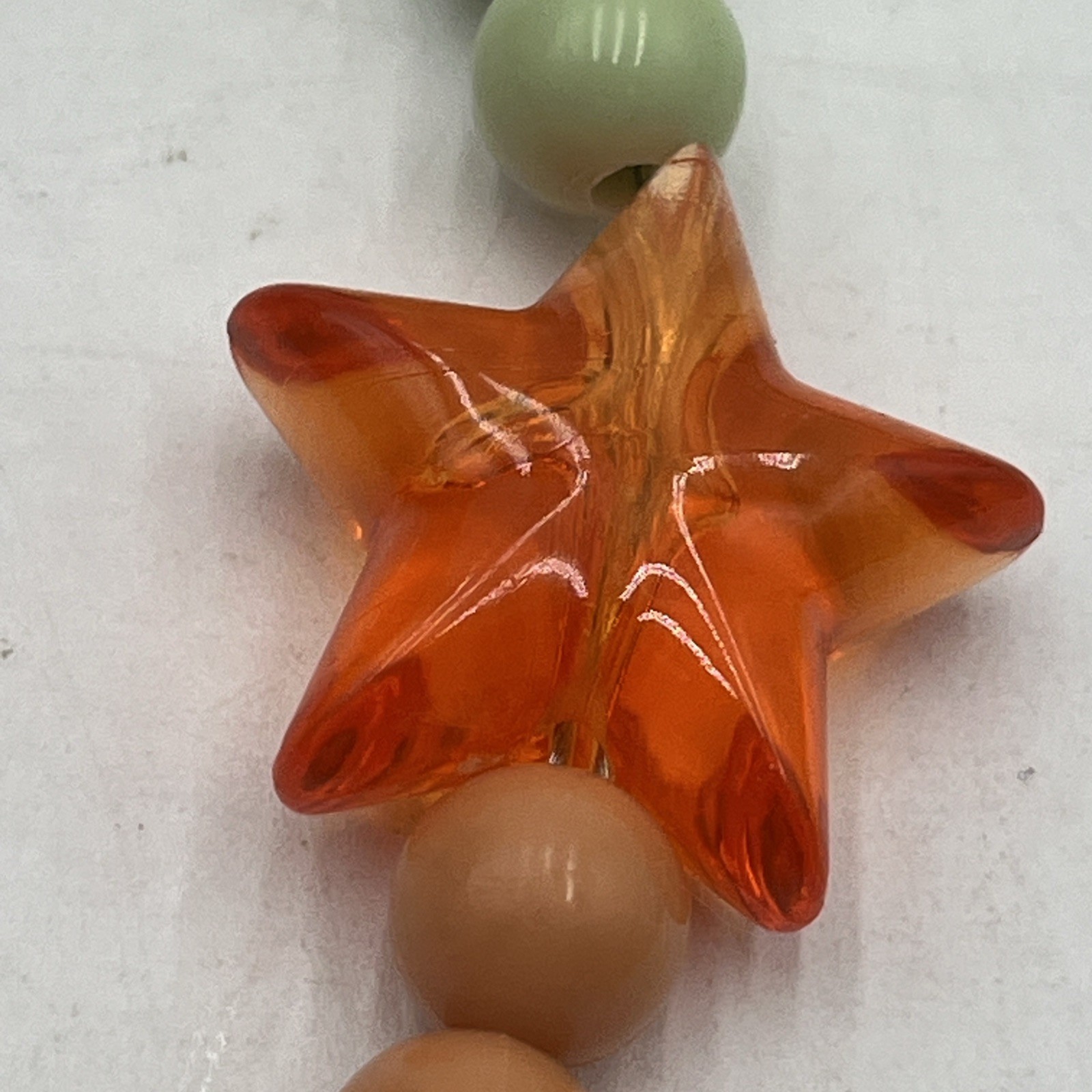 Lucky Star 15” Glow In The Dark Light Up Green & Orange Beaded Alien Necklace