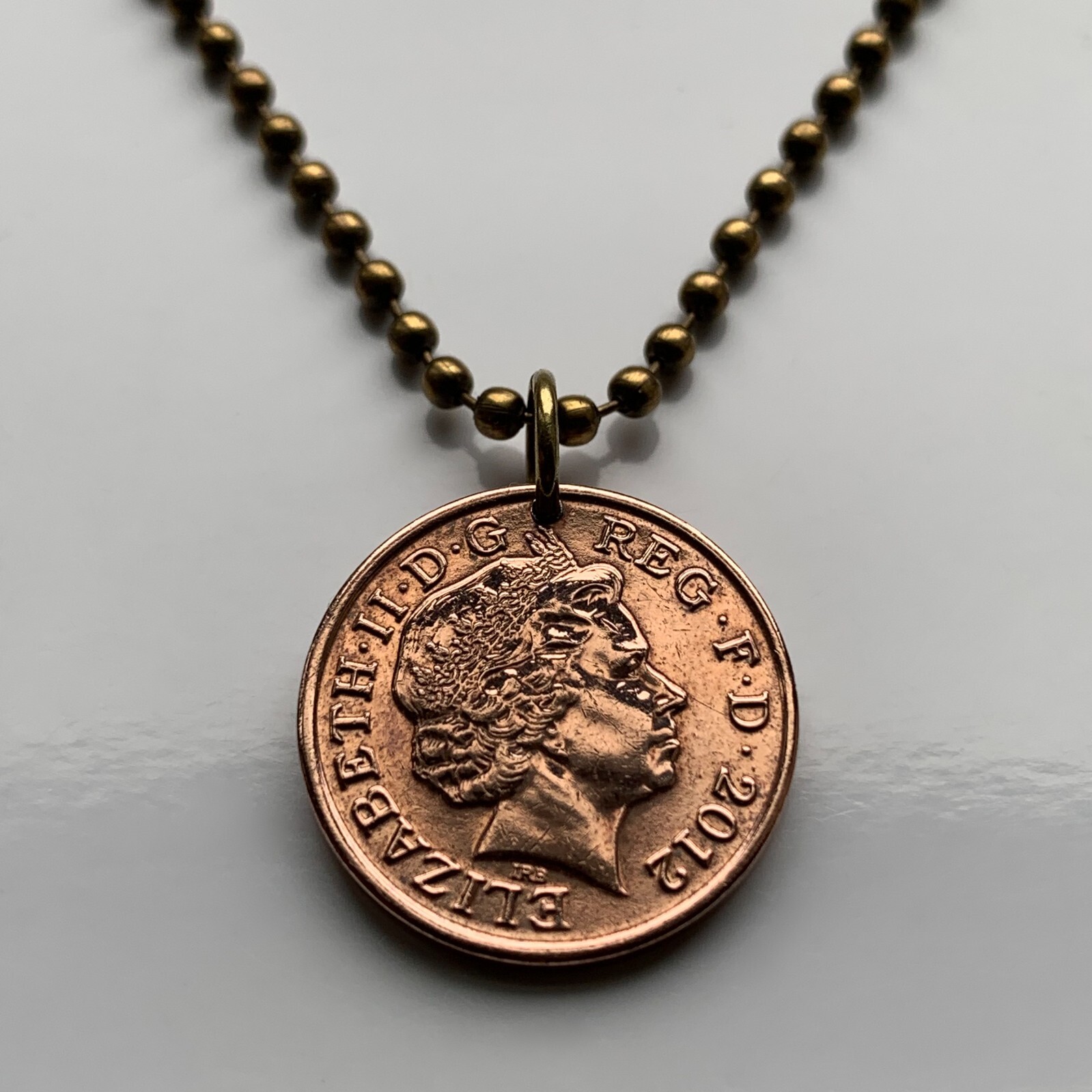 2012 United Kingdom coin pendant Irish harp English lions Belfast London 000598