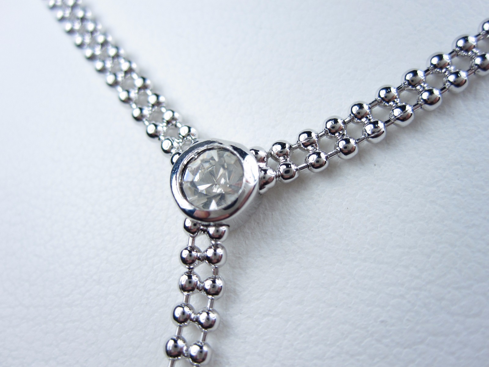 Nina Ricci Rhodium Plated Necklace with Swarovski Crystals – 14-16″ length 0589