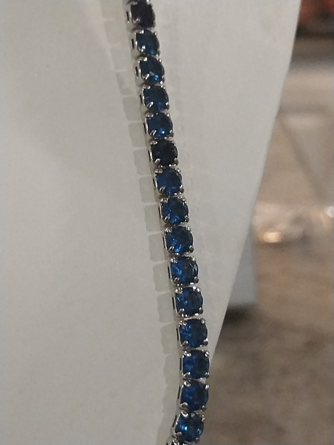 Simulated Sapphire Tennis Necklace (18-26 Inches) with Bolo Slider in Silvertone