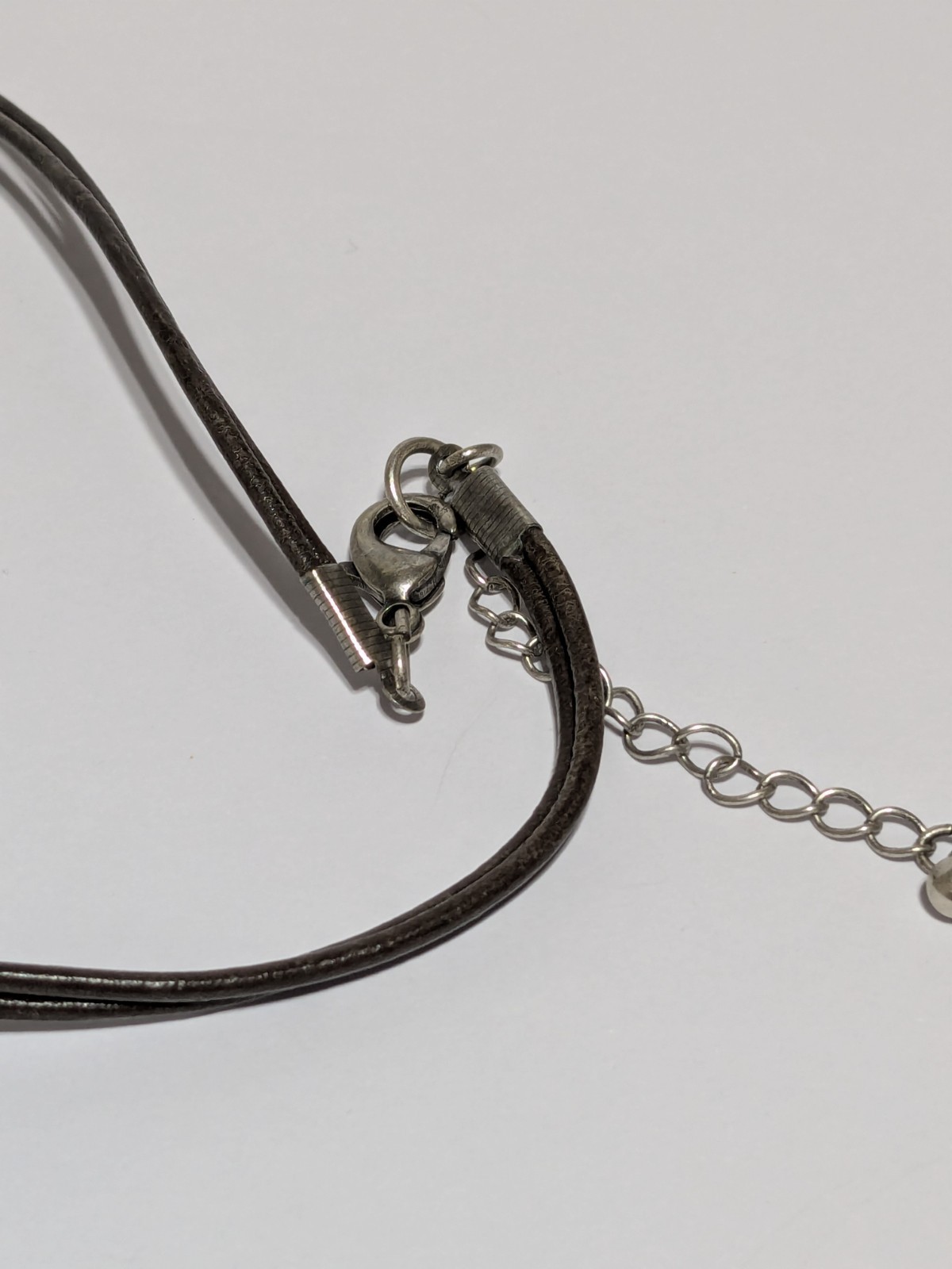 Faux Leather Brown Necklace With Silver Tone & Green Enamel Medallion Pendant