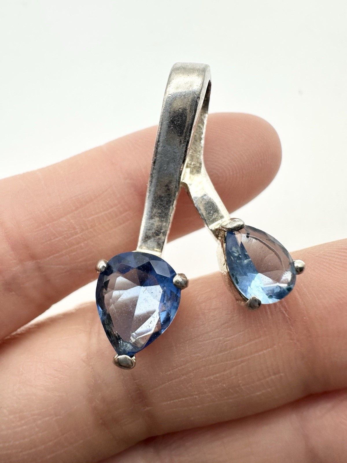 Silver Tone Trillion Cut Blue Stone Pendant