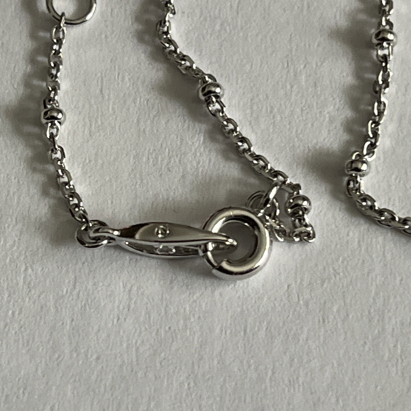 NadriLove Engraved Mom Heart Pendant Necklace in rhodium finish.