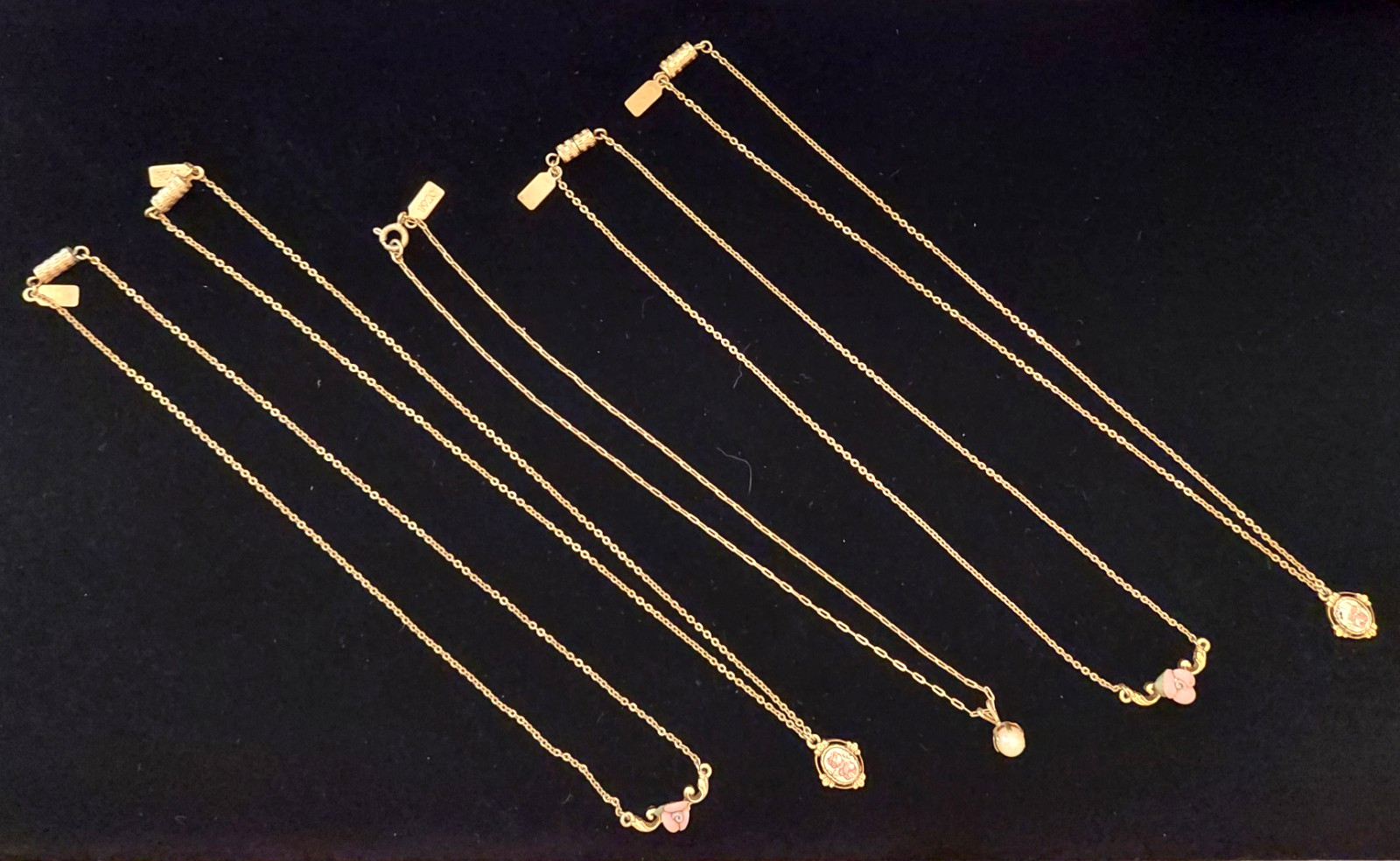 5 Gorgeous 1928 Brand Delicate Gold Tone Necklaces with various charms/looks