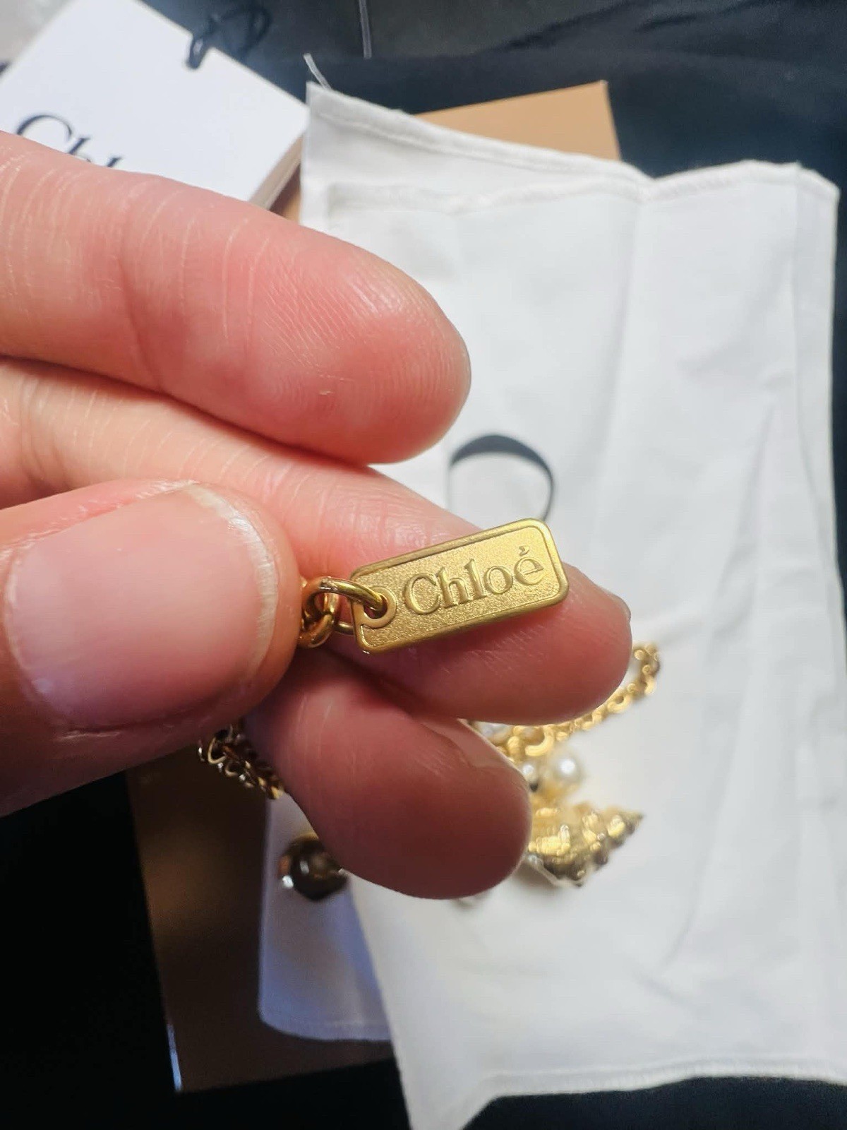 Chloe Shell pearl charm Gold Stone Designer Collection