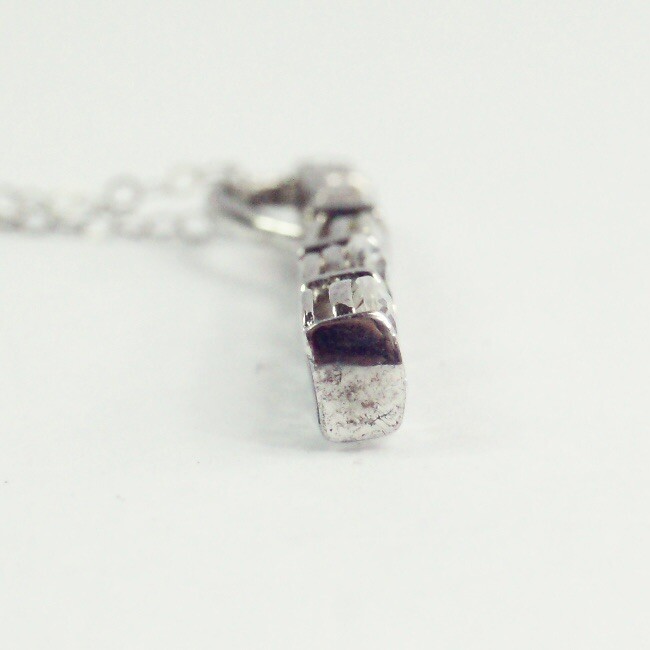 Sterling silver white/colorless CZ graduated five stone pendant necklace