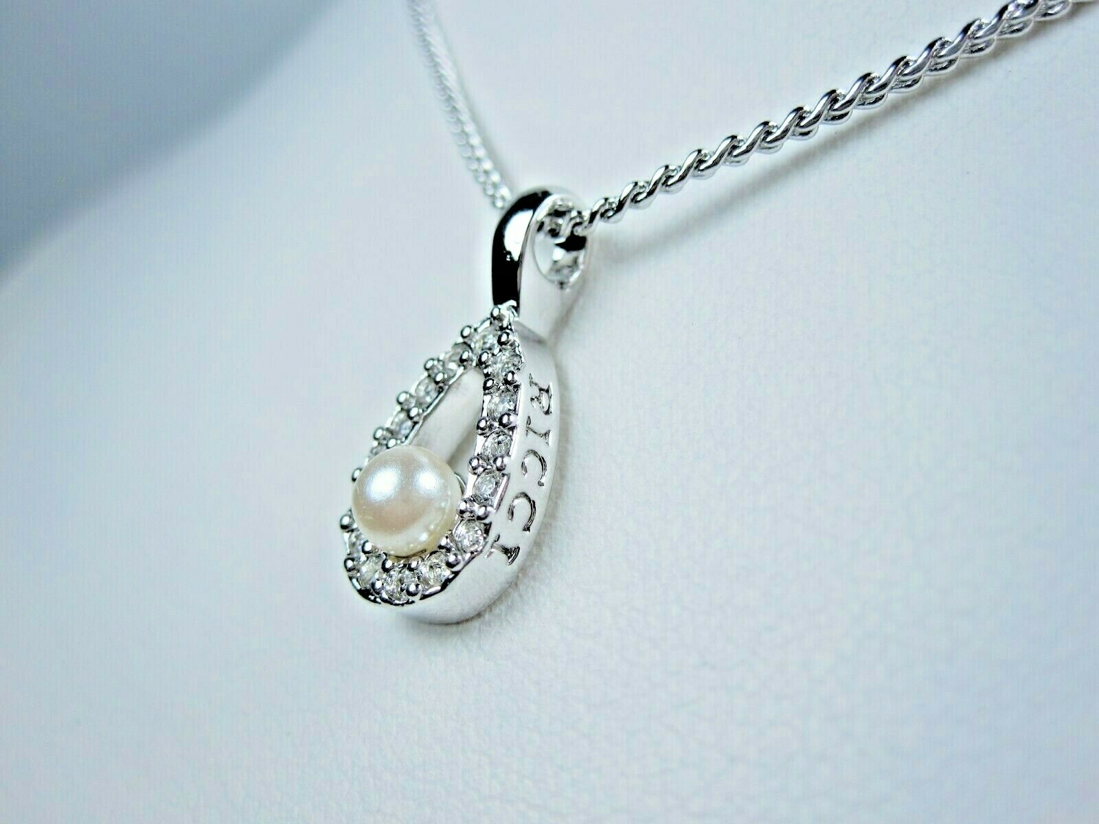 Nina Ricci Rhodium Plated Pendant with Swarovski Crystals & Pearls – 16-18″ 1761