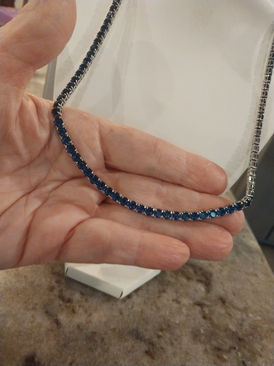 Simulated Sapphire Tennis Necklace (18-26 Inches) with Bolo Slider in Silvertone