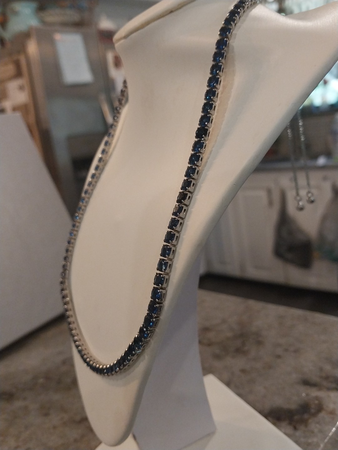Simulated Sapphire Tennis Necklace (18-26 Inches) with Bolo Slider in Silvertone
