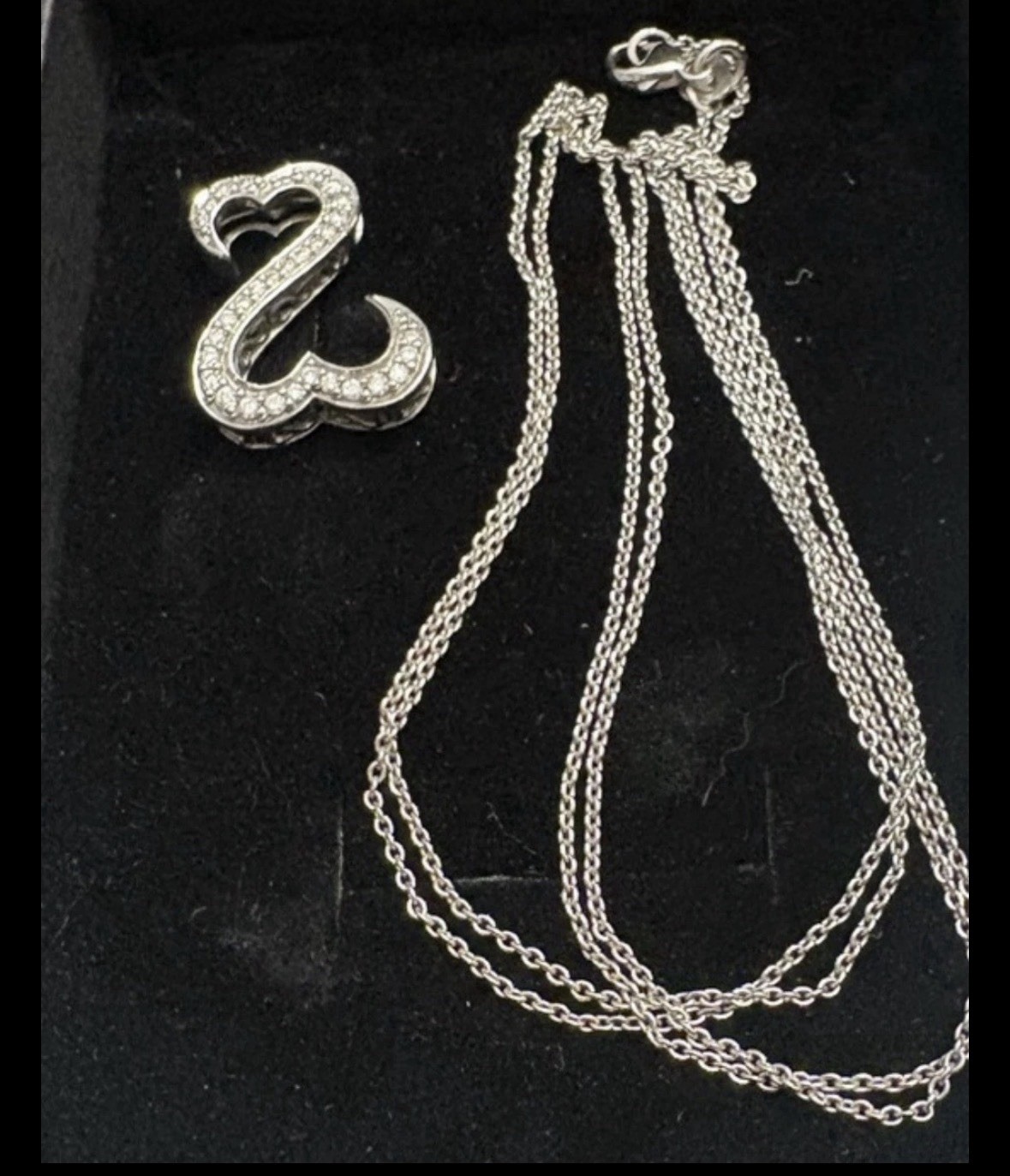 JAme Seymore open heart white gold chain and pendant 1/4 carat diamond