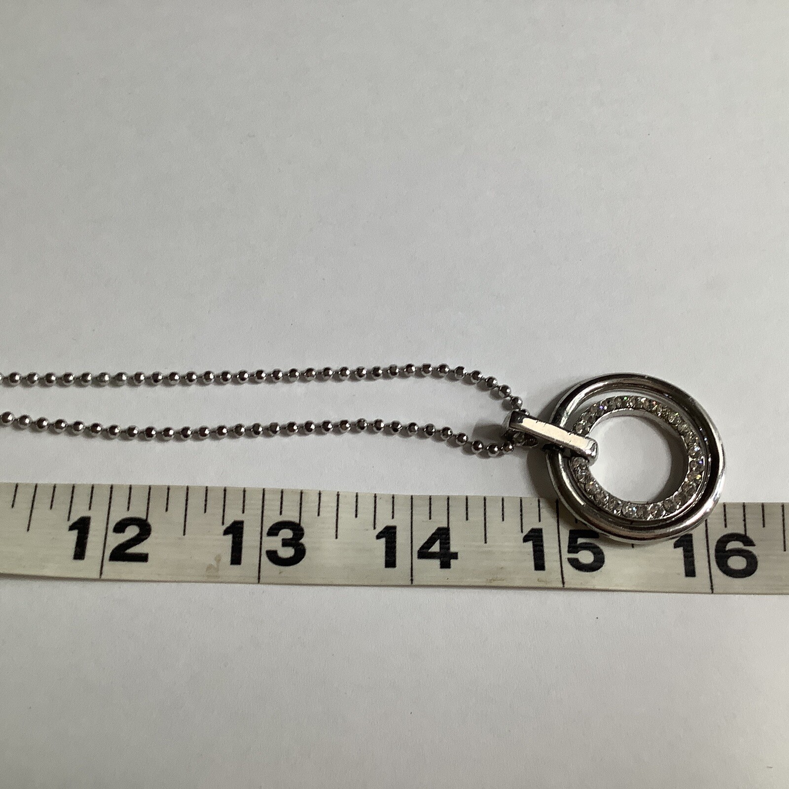 Cookie Lee Silver Tone 2 Circle Hoop RhinestonePendant Necklace 32″ total