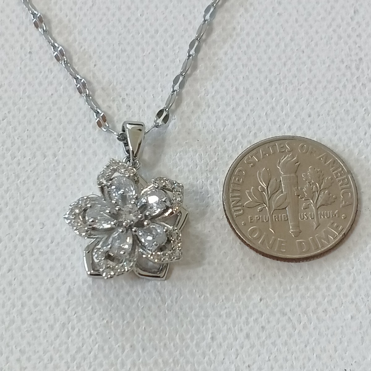 Women Rotating Flower pendant Necklace Stainless steel silver 15 in length