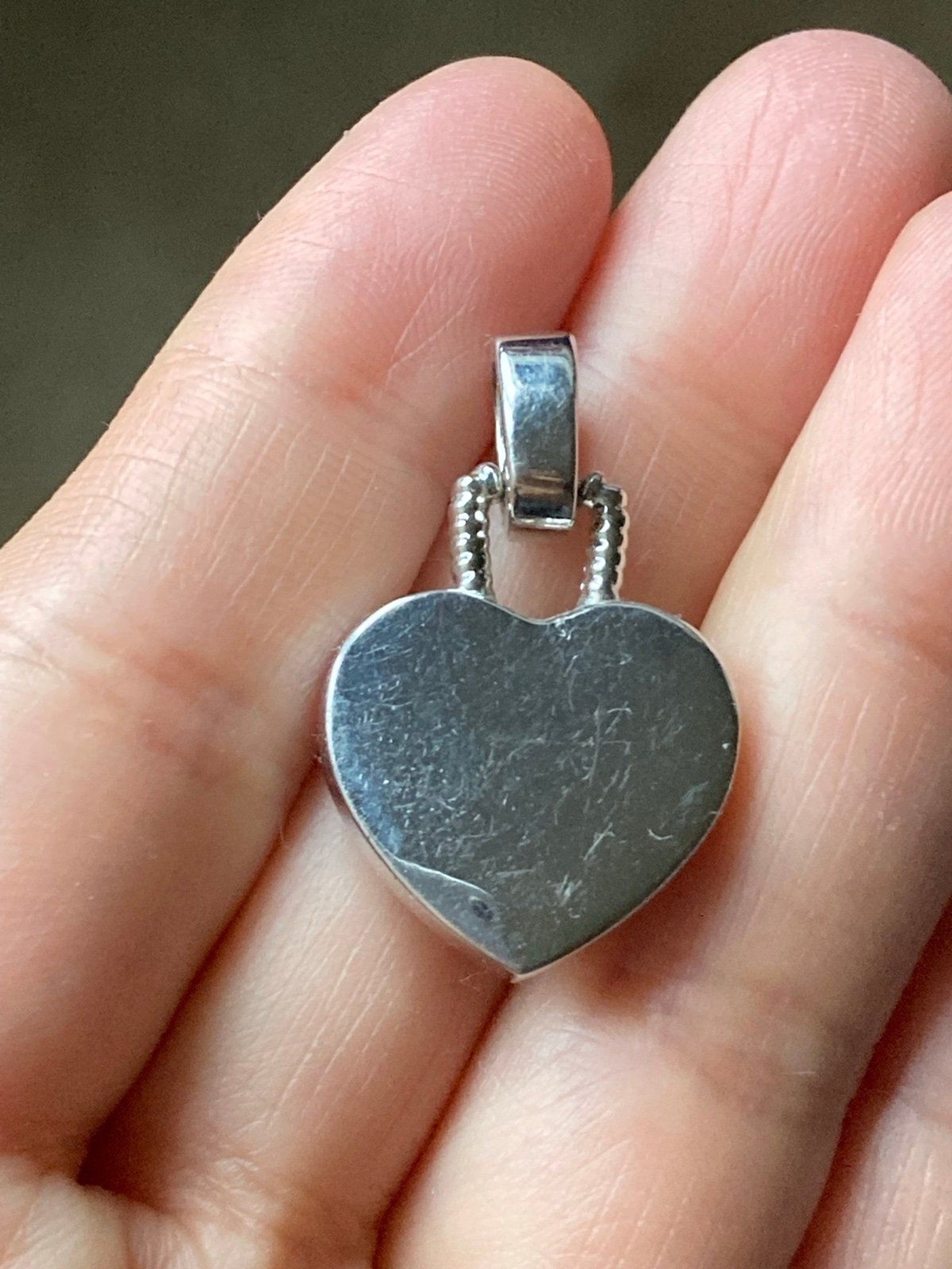 Rhodium plated genuine diamond heart pendant