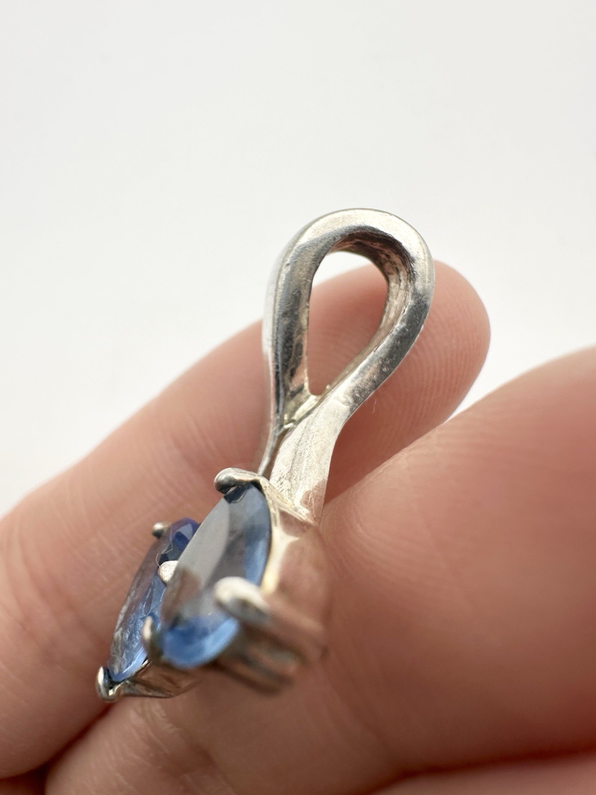 Silver Tone Trillion Cut Blue Stone Pendant