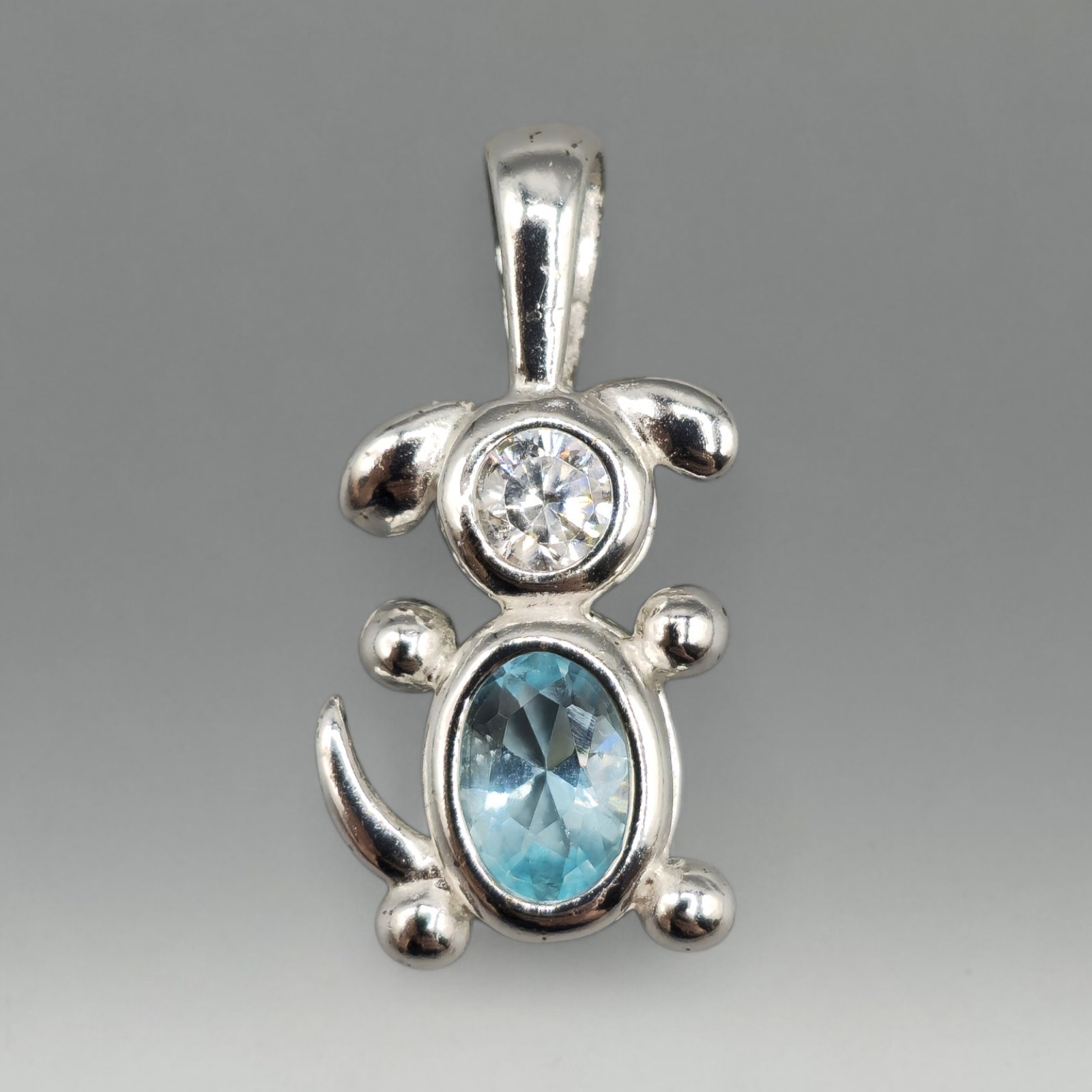Sterling Silver Dog Bezel/Prong Set Cubic Zirconia Blue Simulated Stone Pendant