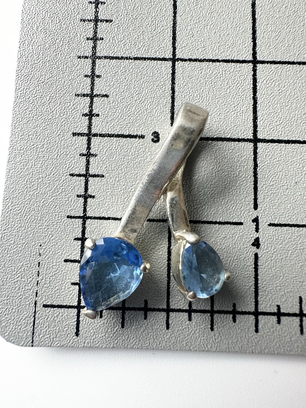 Silver Tone Trillion Cut Blue Stone Pendant